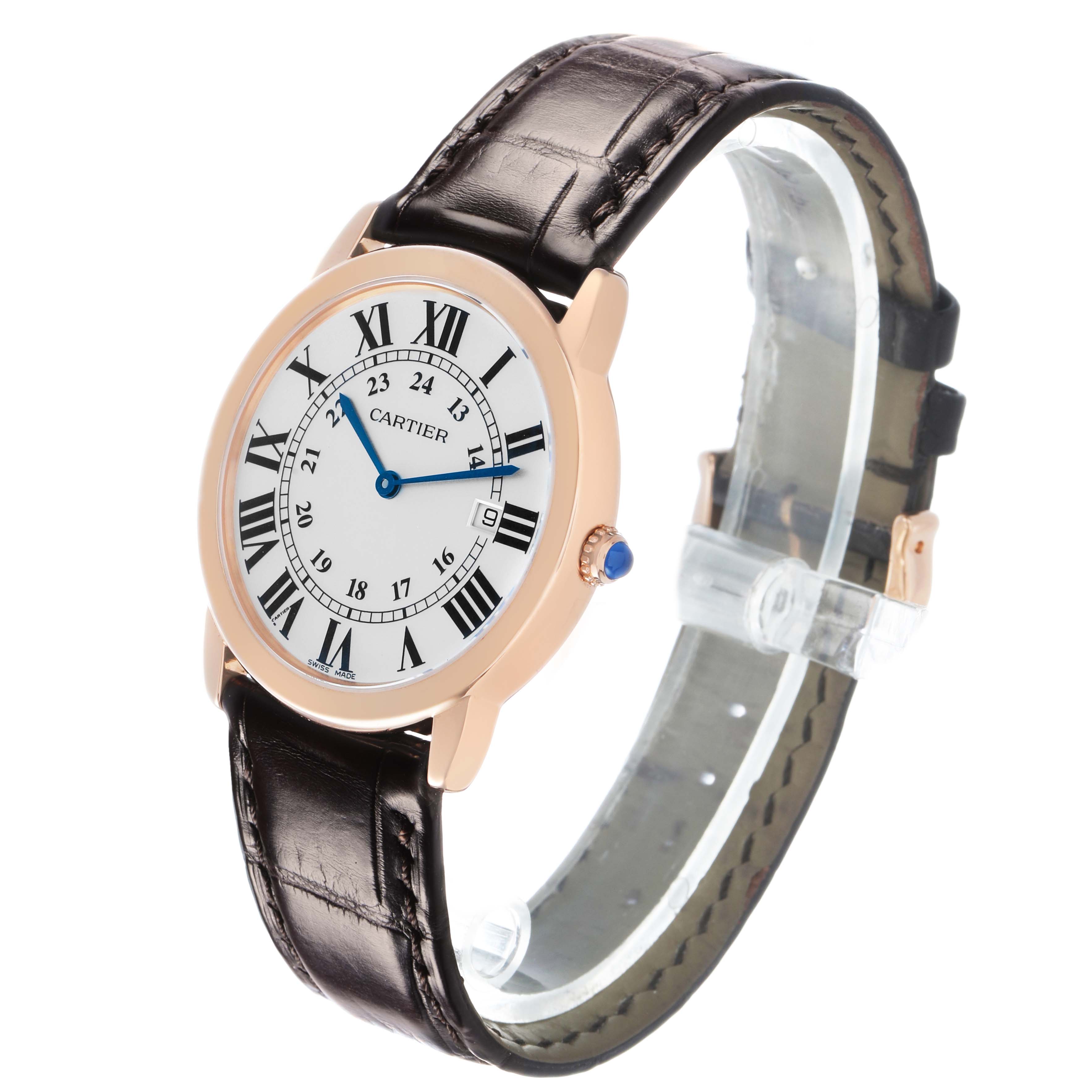 The Cartier Ronde W6701008 Men's Steel and Gold (two tone) Silver Dial watch is shown at a three-quarter angle, highlighting the dial, case, and leather strap.