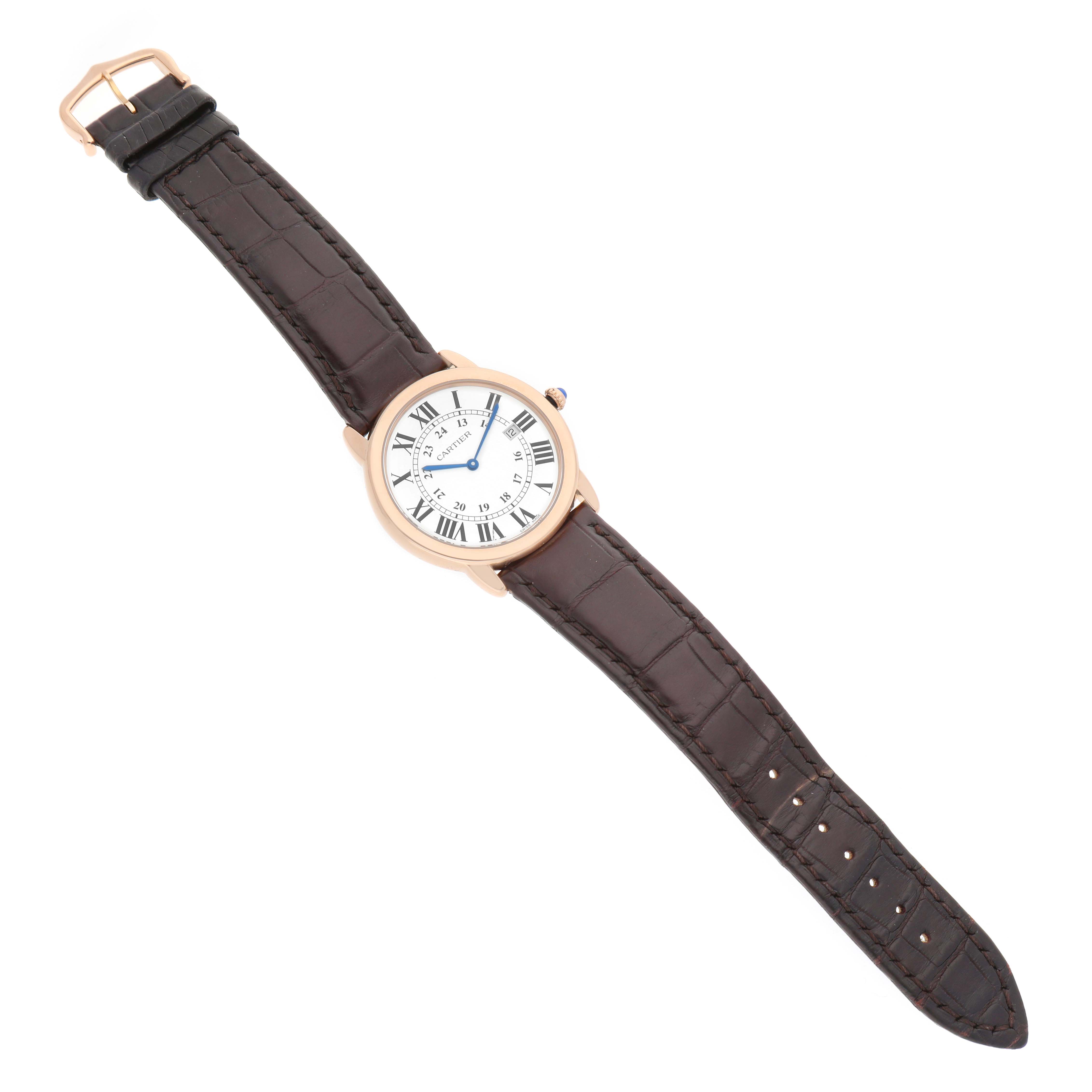 The Cartier Ronde W6701008 Men's Steel and Gold (two tone) Silver Dial watch is shown from a top-down angle, displaying the face, case, and brown leather strap.