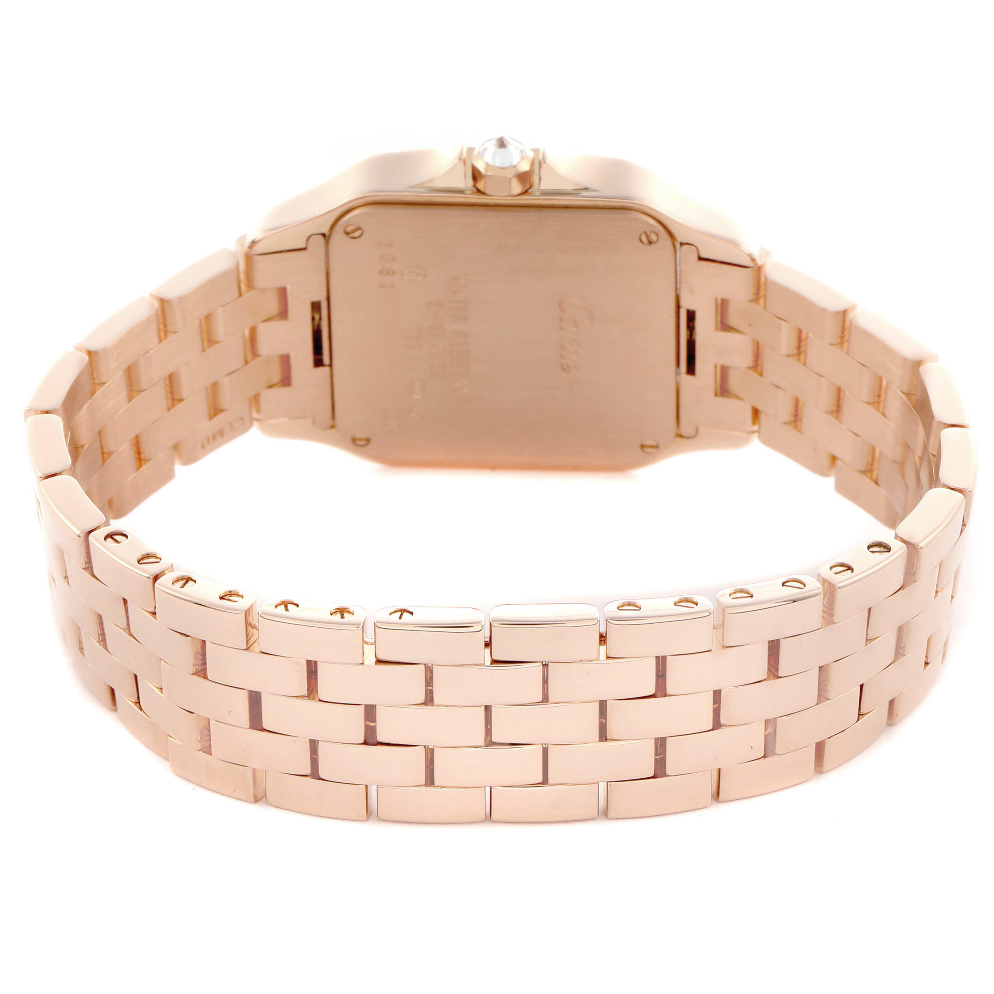 The image shows the back view of the Cartier Santos Demoiselle WF9007Z8 Women
s Rose Gold Silver Dial WF9007Z8 Women
s Rose Gold Silver Dial watch, highlighting its bracelet and case back.