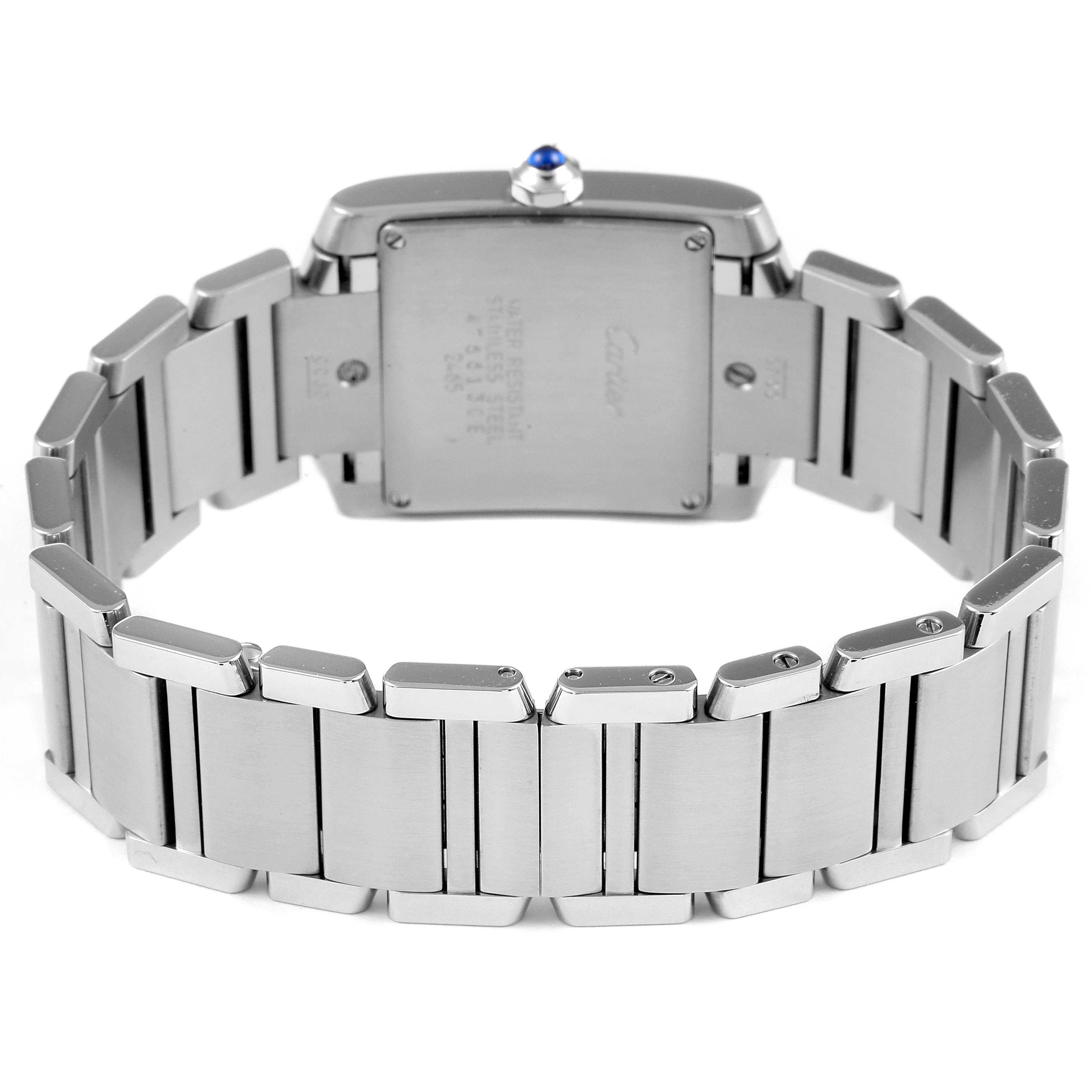 This image shows the back view of a Cartier Tank Française watch, including its metal bracelet and case back.