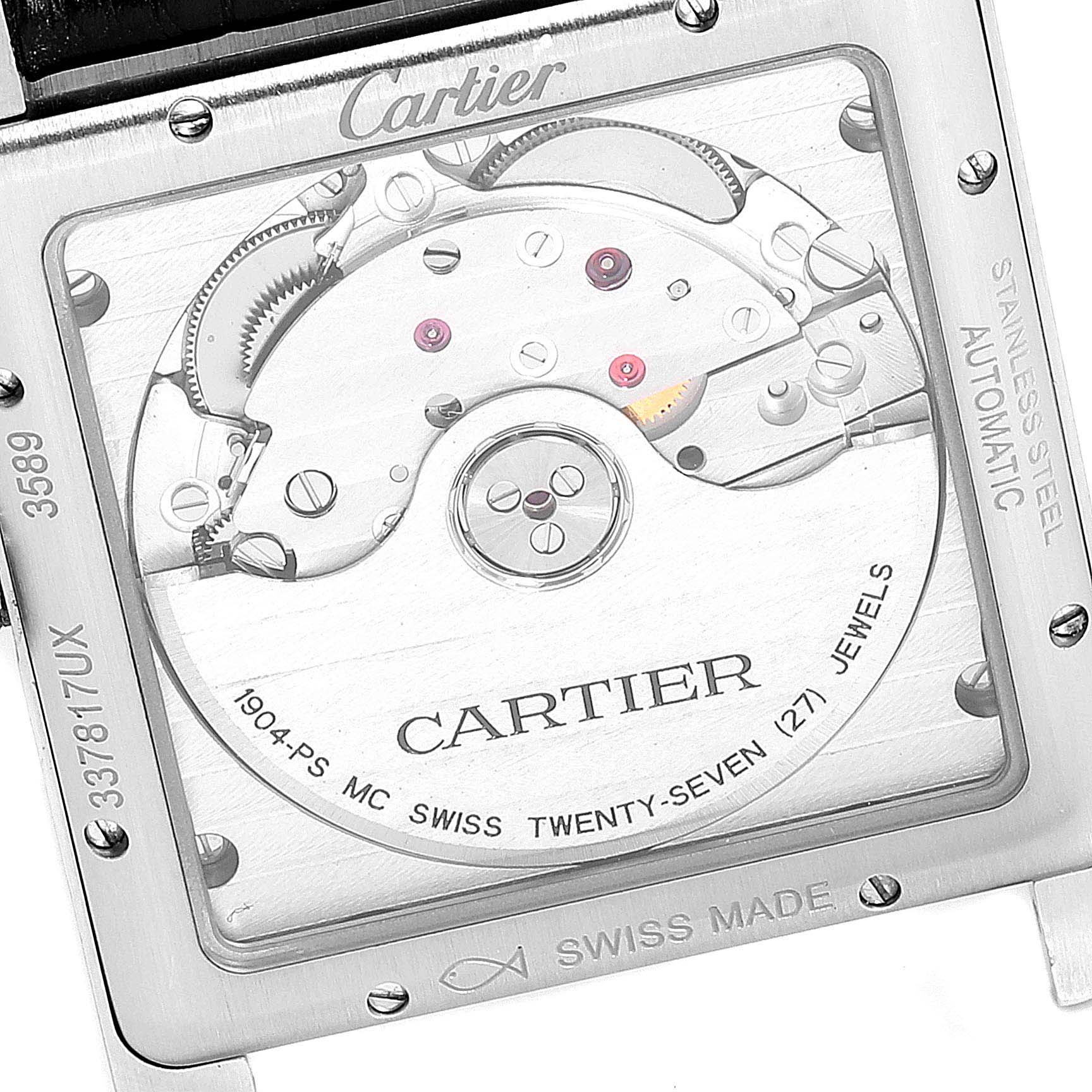 The image shows a close-up of the back of a Cartier Tank MC W5330004 Men's Stainless Steel Black Dial W5330004 Men's Stainless Steel Black Dial watch, displaying the automatic movement and inscription details.