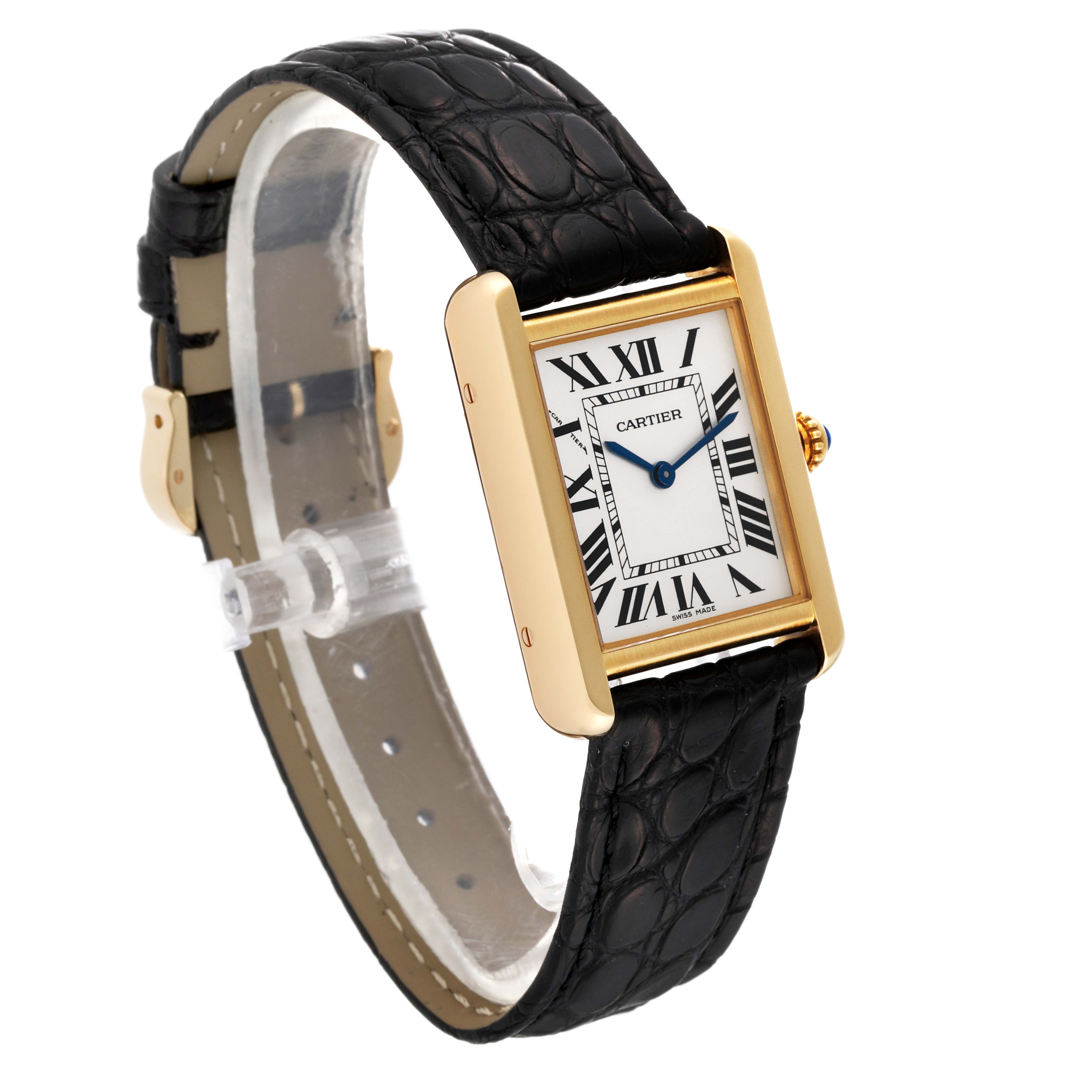 The image shows a Cartier Tank Solo W1018755 Women's Steel and Gold (two tone) Silver Dial W1018755 Women's Steel and Gold (two tone) Silver Dial watch at an angle, featuring the rectangular face, Roman numerals, black leather strap, and gold casing.