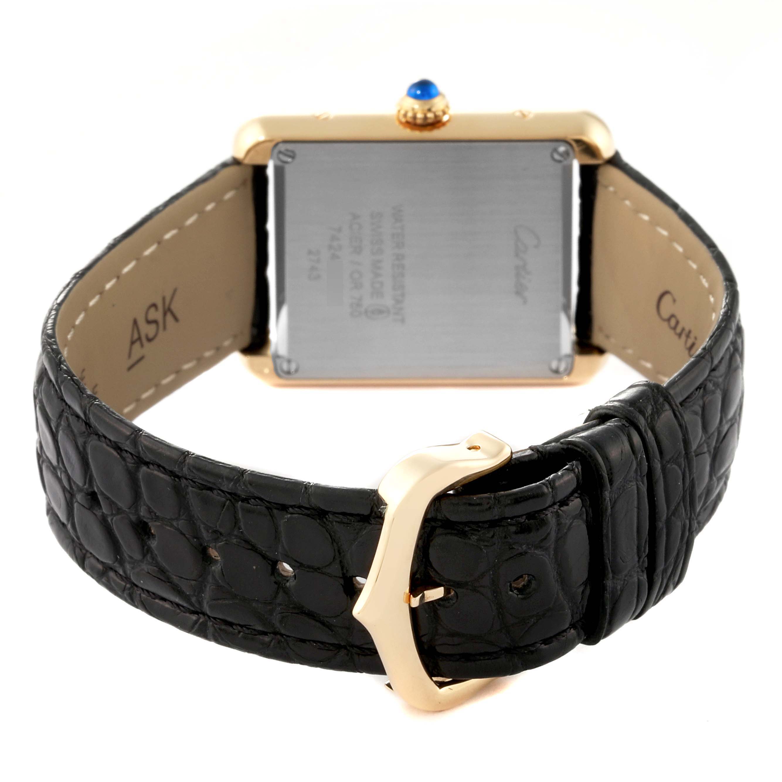 The image shows the back and clasp of a Cartier Tank Solo W1018755 Women's Steel and Gold (two tone) Silver Dial W1018755 Women's Steel and Gold (two tone) Silver Dial watch with a black leather strap.