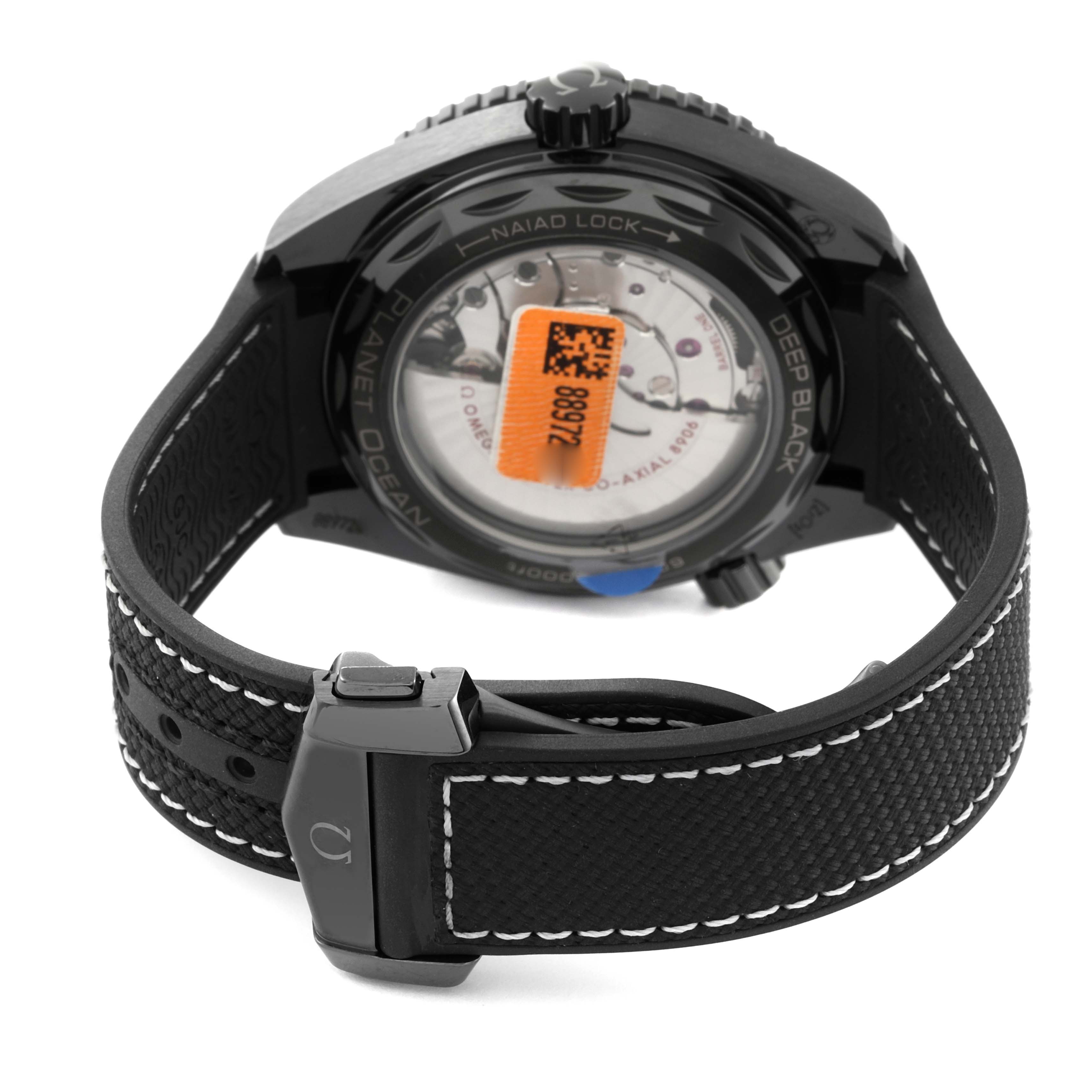 The image shows the back view of an Omega Planet Ocean 215.82.46.22.01.001 Men's Ceramic Black Dial 215.82.46.22.01.001 Men's Ceramic Black Dial watch, highlighting the case back and strap.