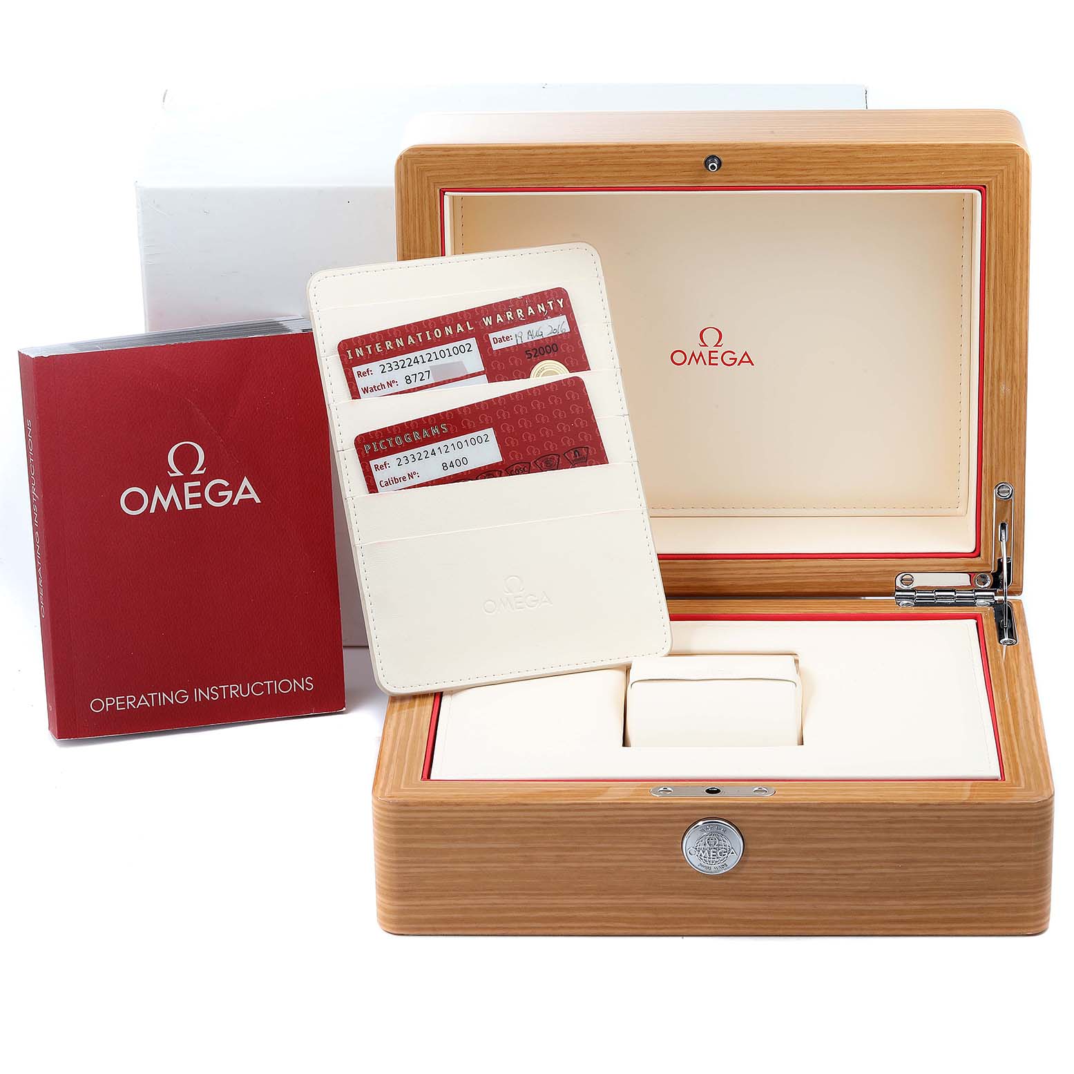 This image shows the packaging, international warranty, pictogram cards, and operating instructions for an Omega Seamaster 233.22.41.21.01.002 Men's Steel and Gold (two tone) Black Dial 233.22.41.21.01.002 Men's Steel and Gold (two tone) Black Dial watch.