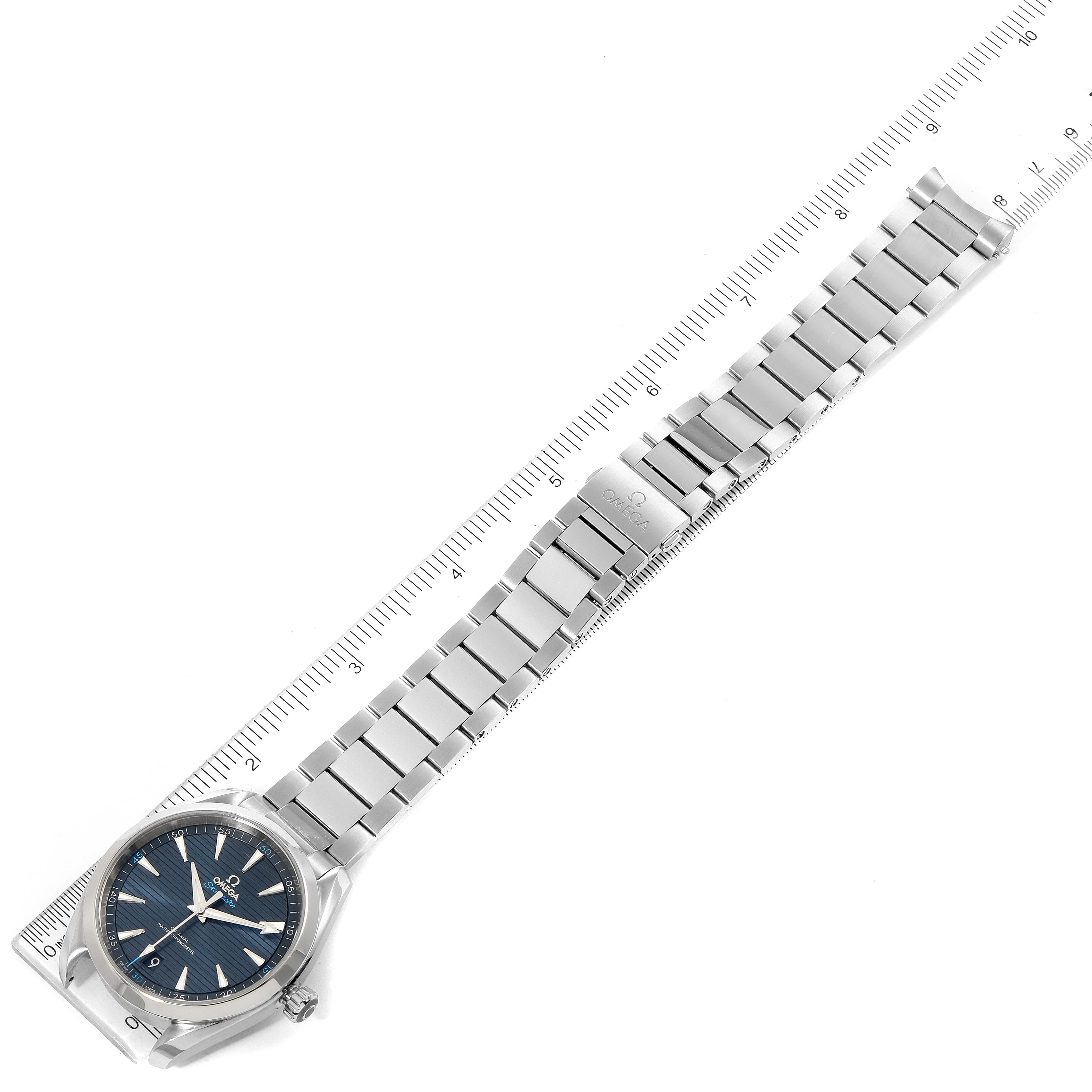 This image shows the Omega Aqua Terra 220.10.41.21.03.001 Men
s Stainless Steel Blue Dial 220.10.41.21.03.001 Men
s Stainless Steel Blue Dial watch with a stainless steel bracelet, laid flat next to a ruler for scale.