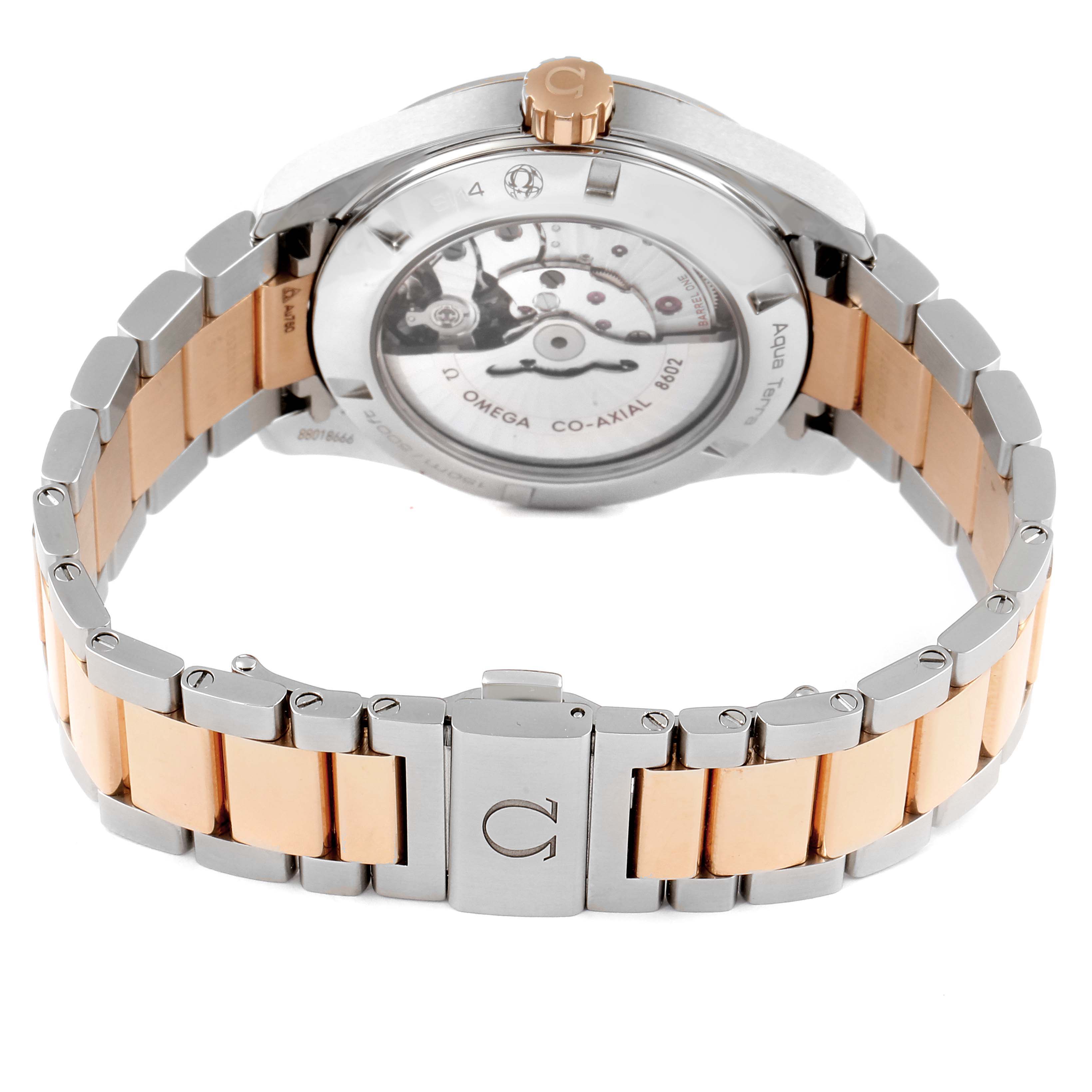 The image shows the back view of the Omega Aqua Terra 231.20.42.22.06.001 Men
s Steel and Gold (two tone) Grey Dial 231.20.42.22.06.001 Men
s Steel and Gold (two tone) Grey Dial watch, displaying its movement and bi-metal bracelet.