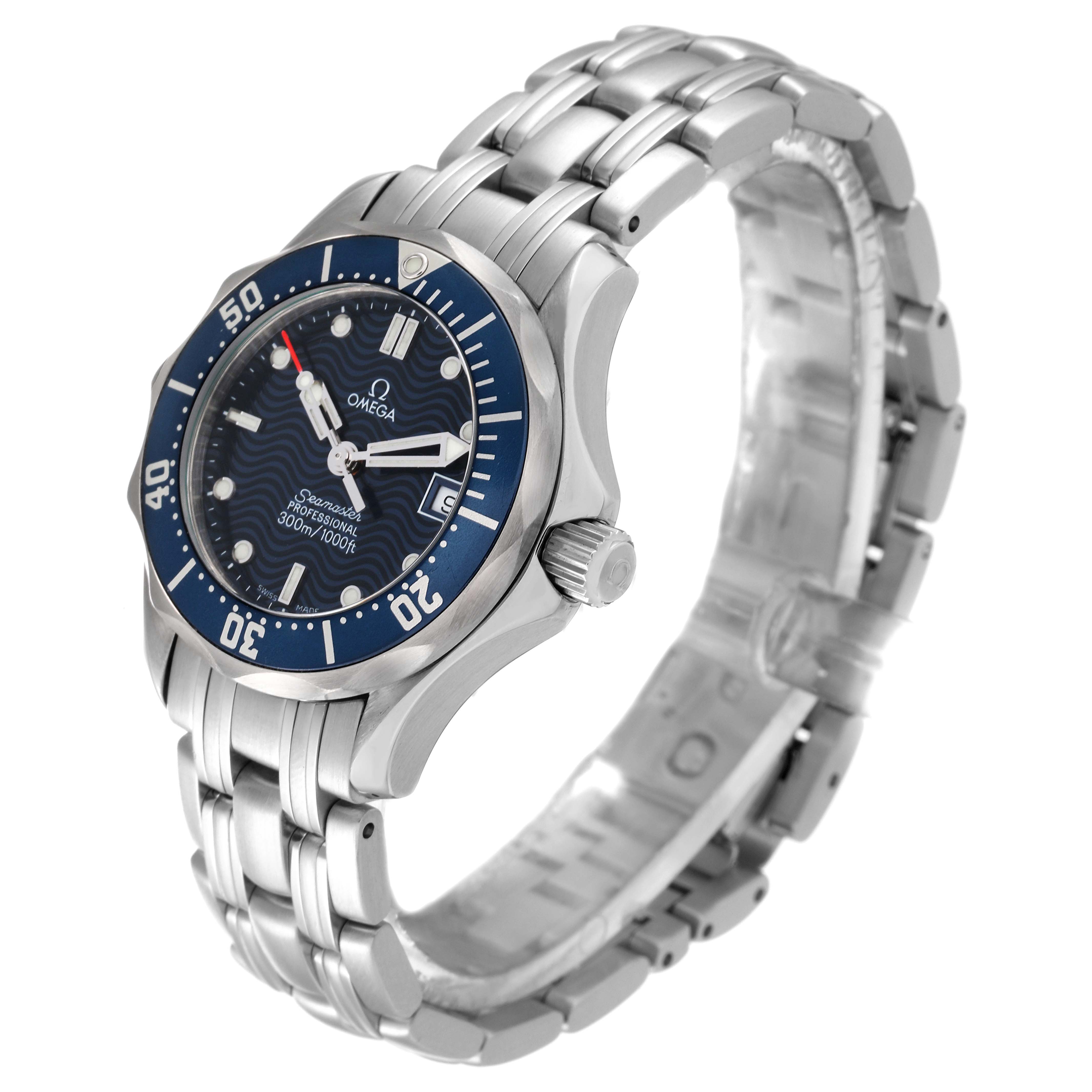 This image shows the Omega 2583.80.00 Women's Stainless Steel Blue Dial 2583.80.00 Women's Stainless Steel Blue Dial Seamaster Diver 300M 28mm Steel Ladies Watch 2583.80.00 at an angled side view, highlighting the bezel, dial, and bracelet.