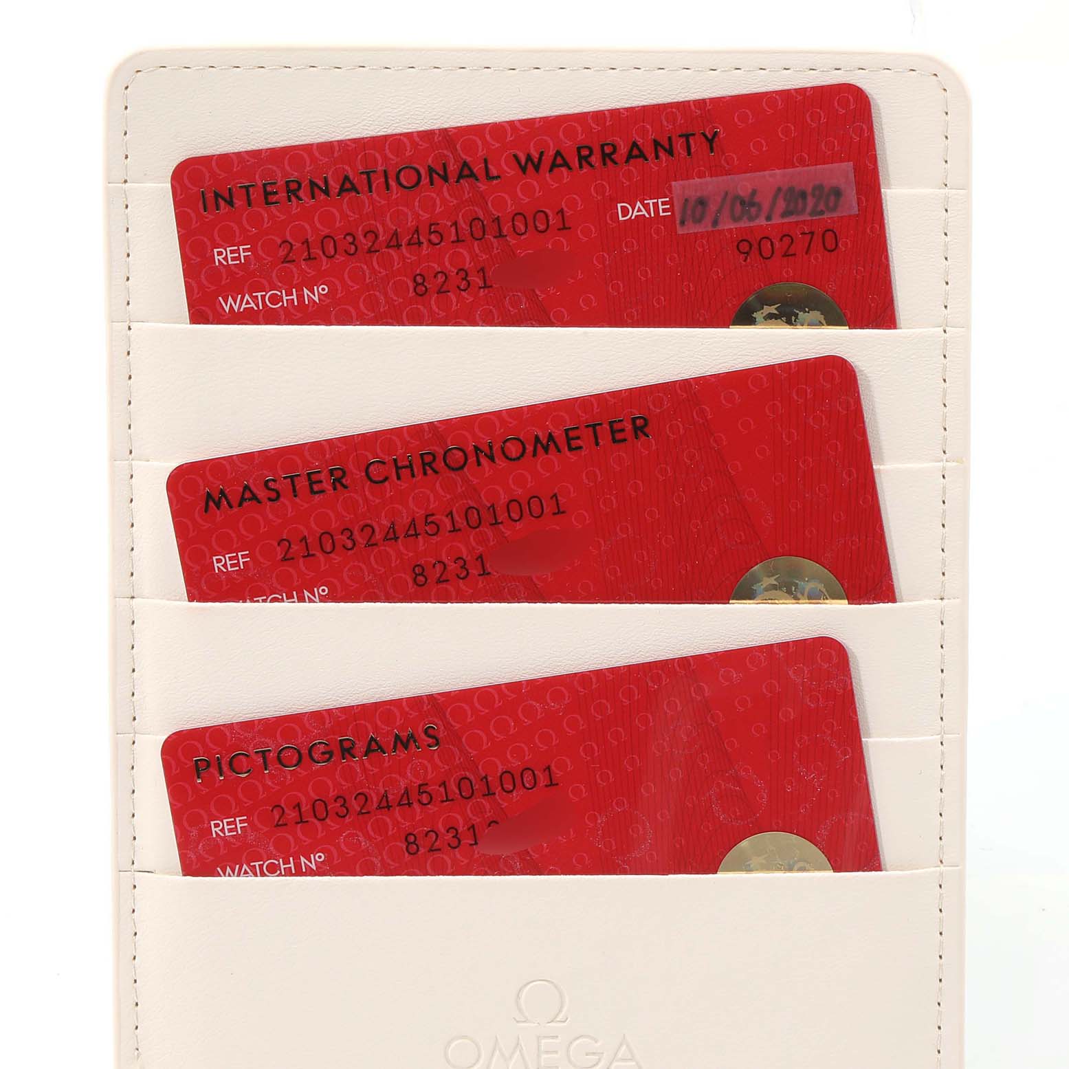 The image shows three warranty and certification cards for an Omega Seamaster 210.32.44.51.01.001 Men's Stainless Steel Black Dial 210.32.44.51.01.001 Men's Stainless Steel Black Dial watch in a white card holder.