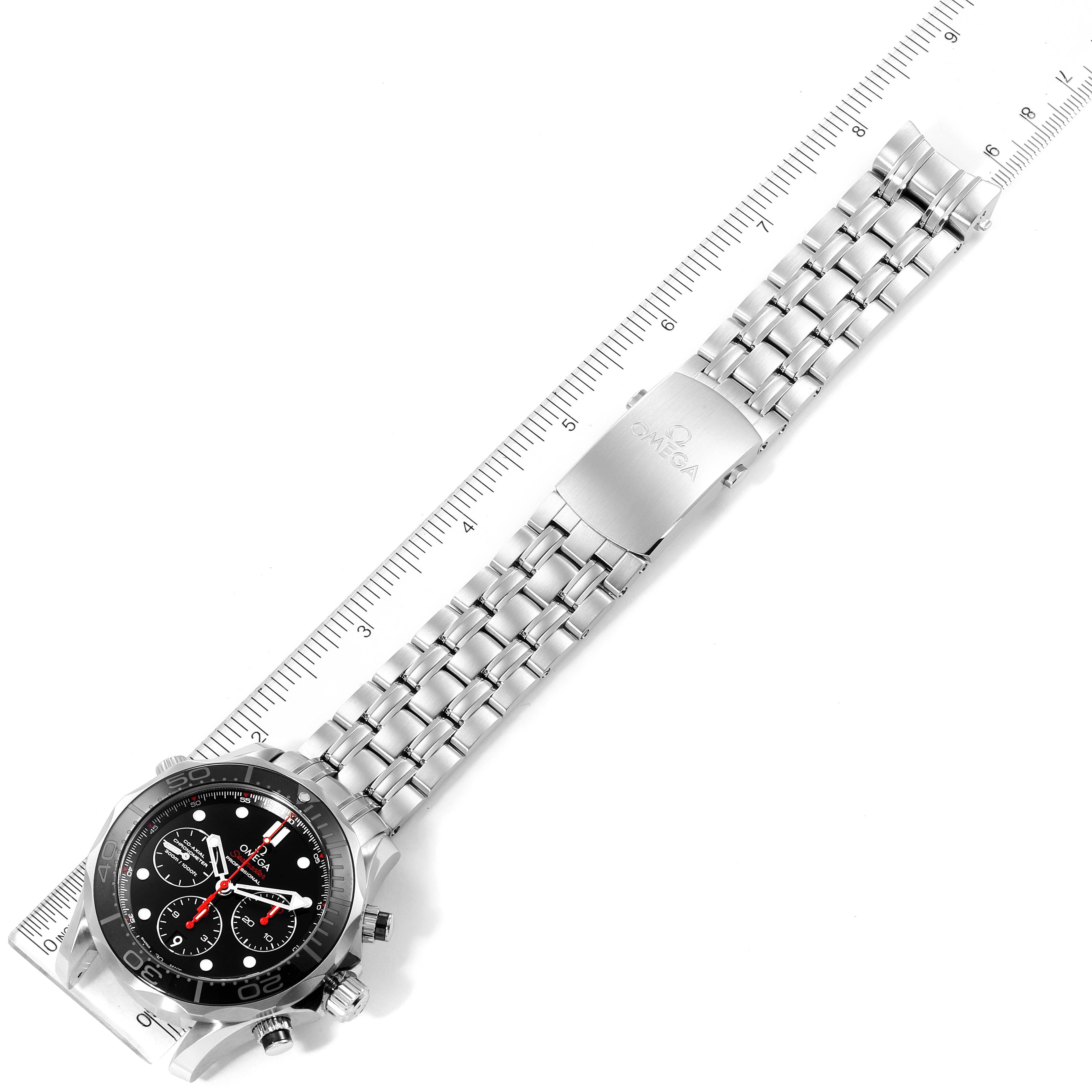 This image shows an Omega Seamaster 212.30.44.50.01.001 Men's Stainless Steel Black Dial 212.30.44.50.01.001 Men's Stainless Steel Black Dial watch laid flat with a metal bracelet and clasp, measured against a ruler.