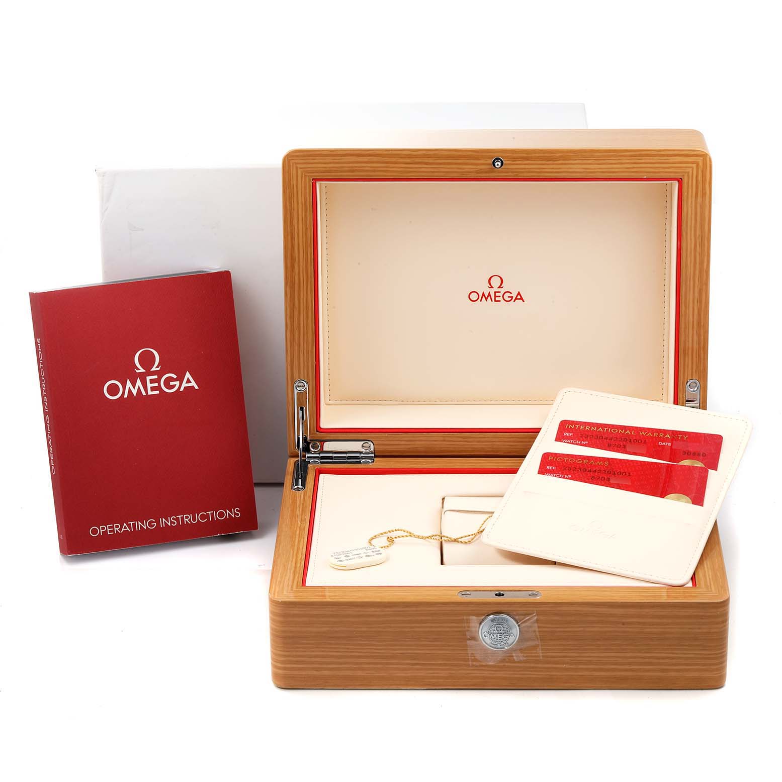 The image shows the Omega Seamaster 232.30.44.22.01.001 Men's Steel and Gold (two tone) Black Dial 232.30.44.22.01.001 Men's Steel and Gold (two tone) Black Dial packaging, including a wooden box, operating instructions, and warranty cards.