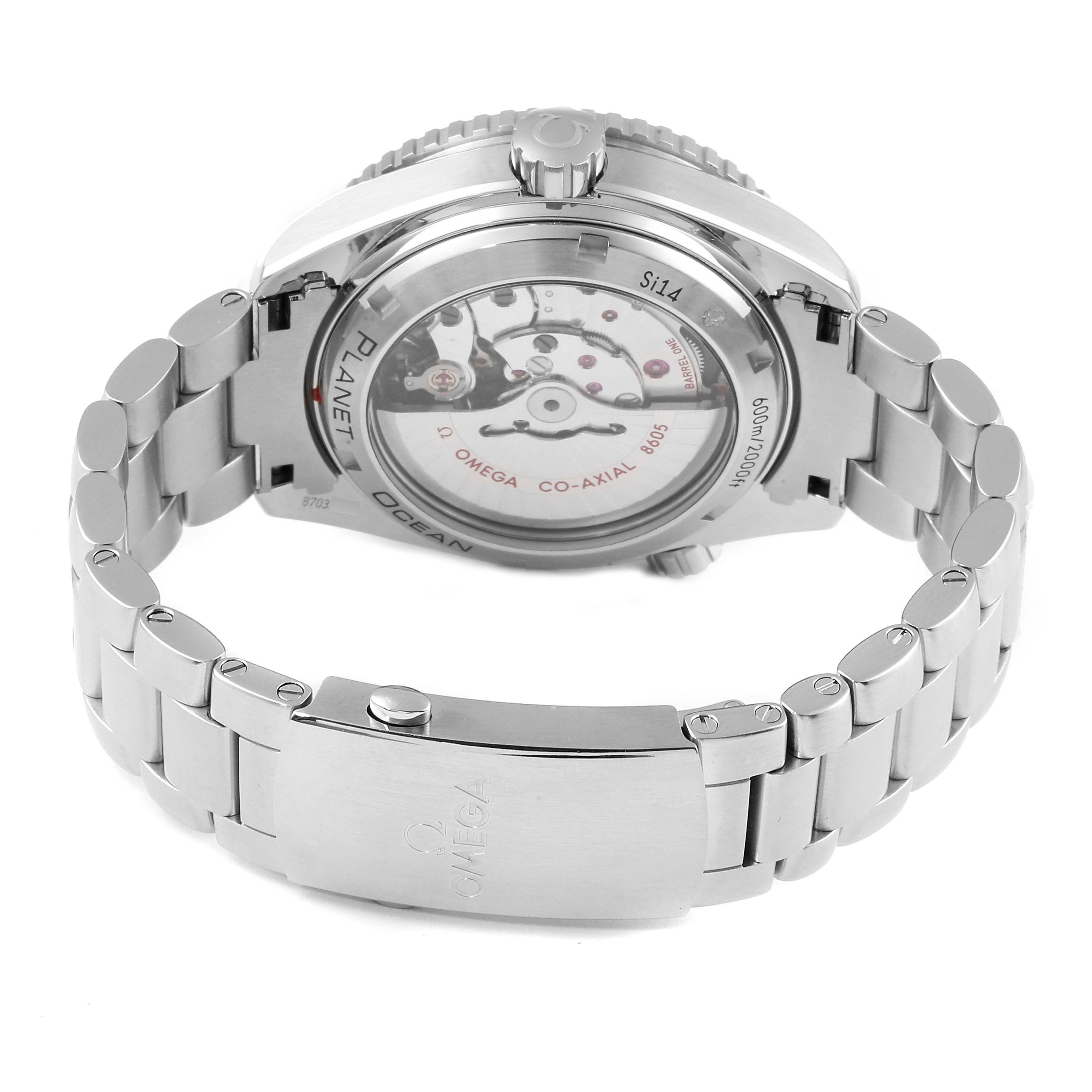 The image shows the back view of the Omega Seamaster 232.30.44.22.01.001 Men's Steel and Gold (two tone) Black Dial 232.30.44.22.01.001 Men's Steel and Gold (two tone) Black Dial watch, highlighting the metal bracelet and the transparent case back displaying the movement.