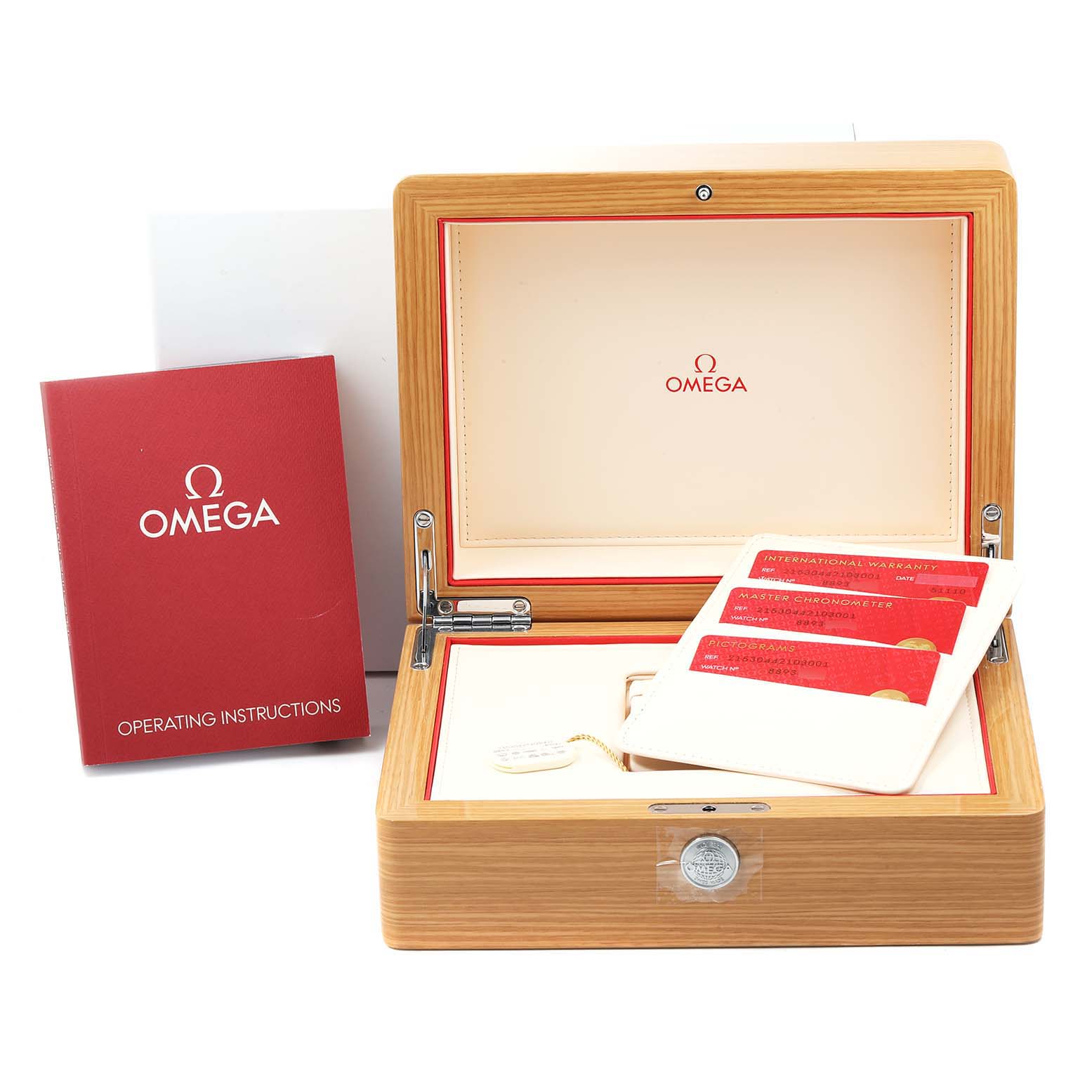 The image shows an Omega Planet Ocean 215.30.44.21.03.001 Men
s Stainless Steel Blue Dial 215.30.44.21.03.001 Men
s Stainless Steel Blue Dial watch box with operating instructions and warranty cards.