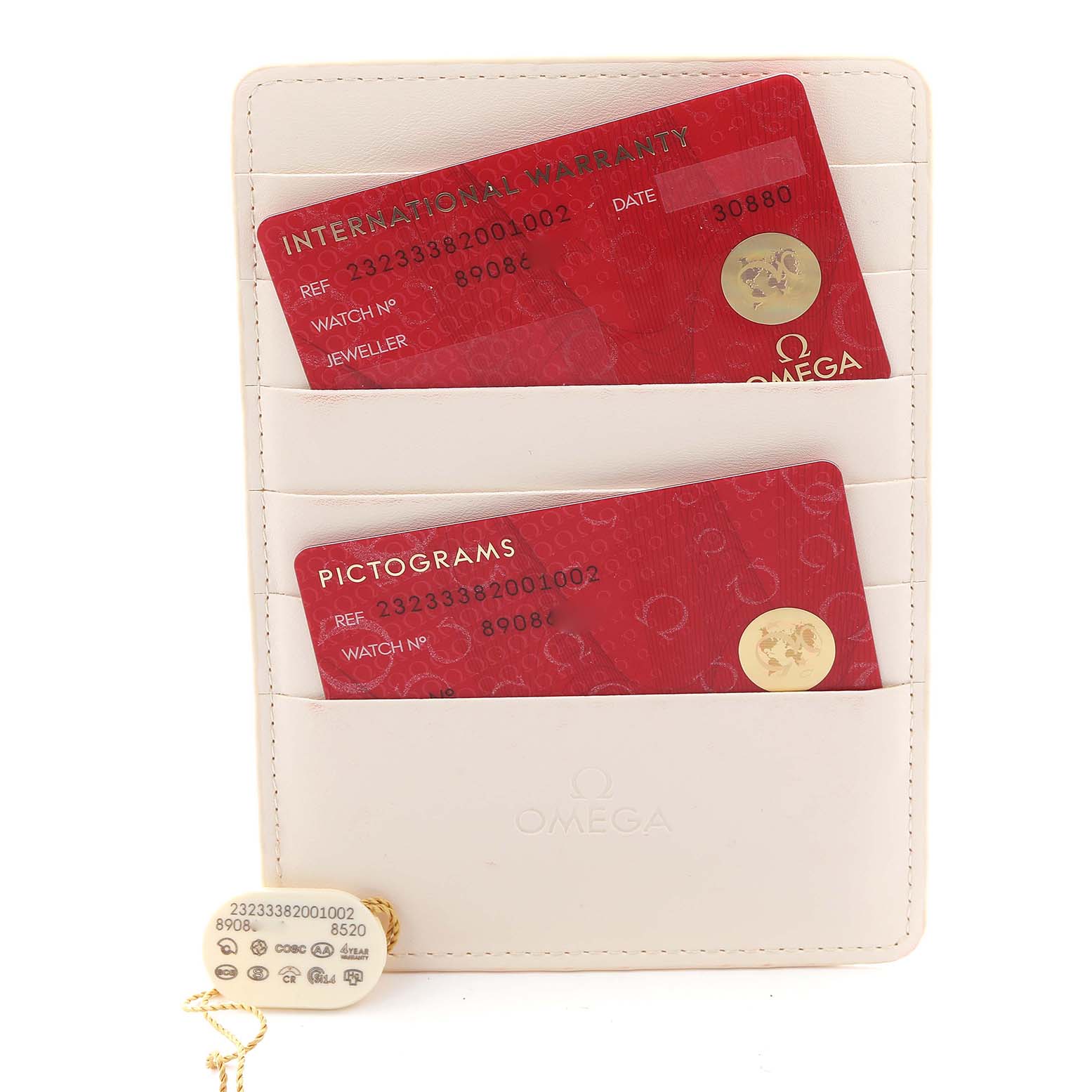 The image shows Omega Planet Ocean 232.33.38.20.01.002 Men
s Stainless Steel Black Dial 232.33.38.20.01.002 Men
s Stainless Steel Black Dial watch accessories, including warranty cards in a holder and an attached tag.