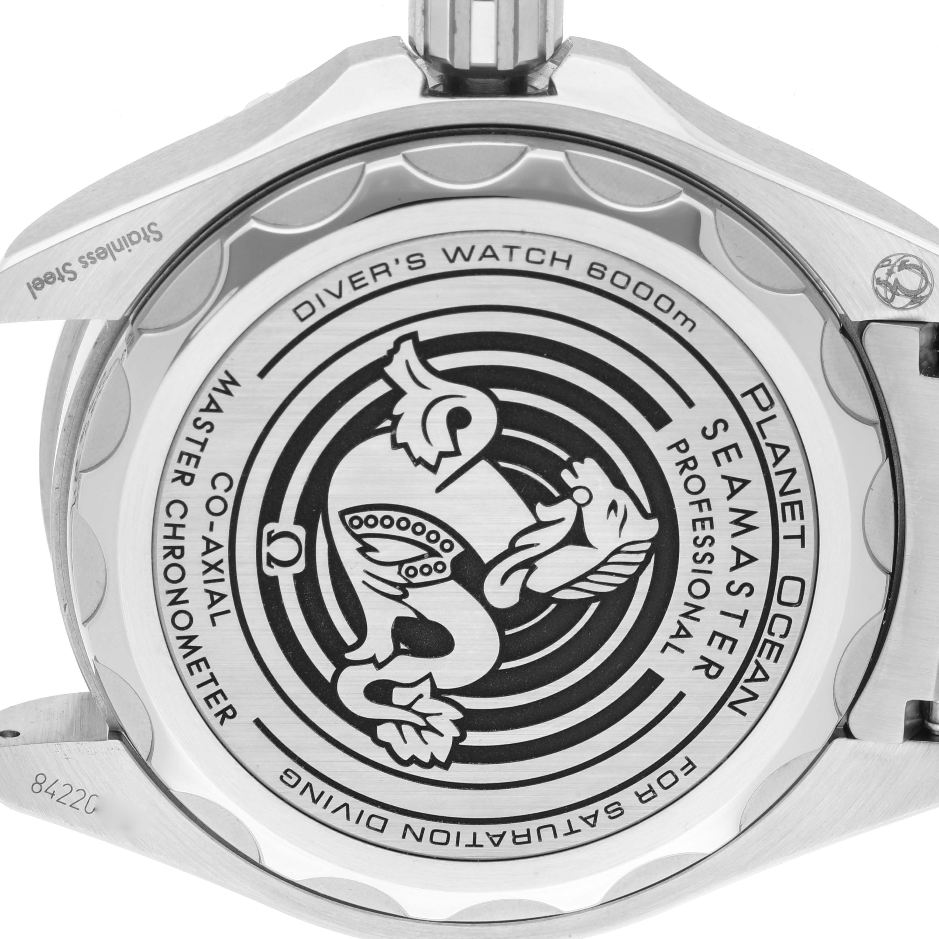 The image shows the case back of the Omega Seamaster Planet Ocean model, highlighting its engraving and branding details.