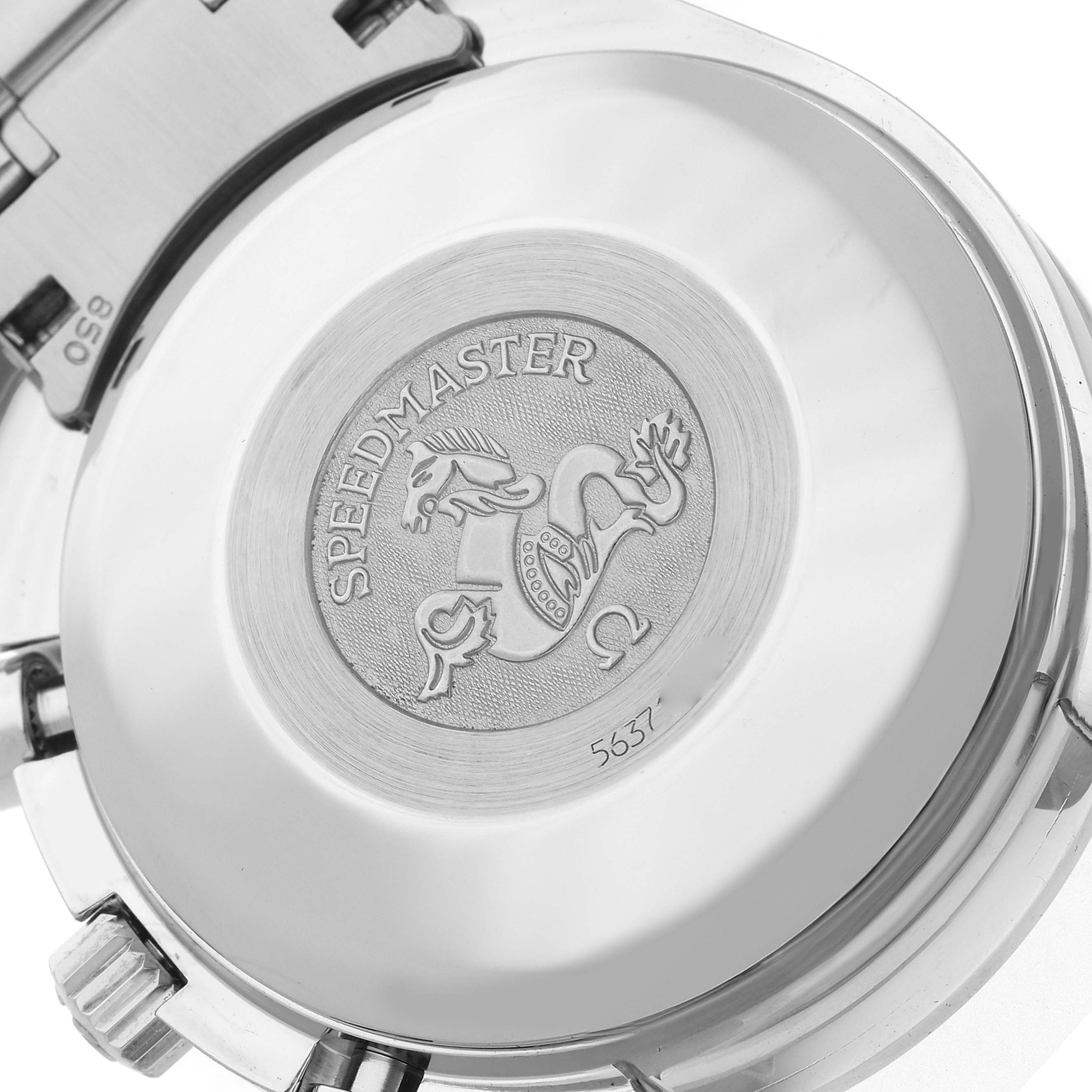 The image shows the case back of the Omega Speedmaster 3520.53.00 Men
s Stainless Steel Grey Dial 3520.53.00 Men
s Stainless Steel Grey Dial, featuring the emblem and part of the bracelet.