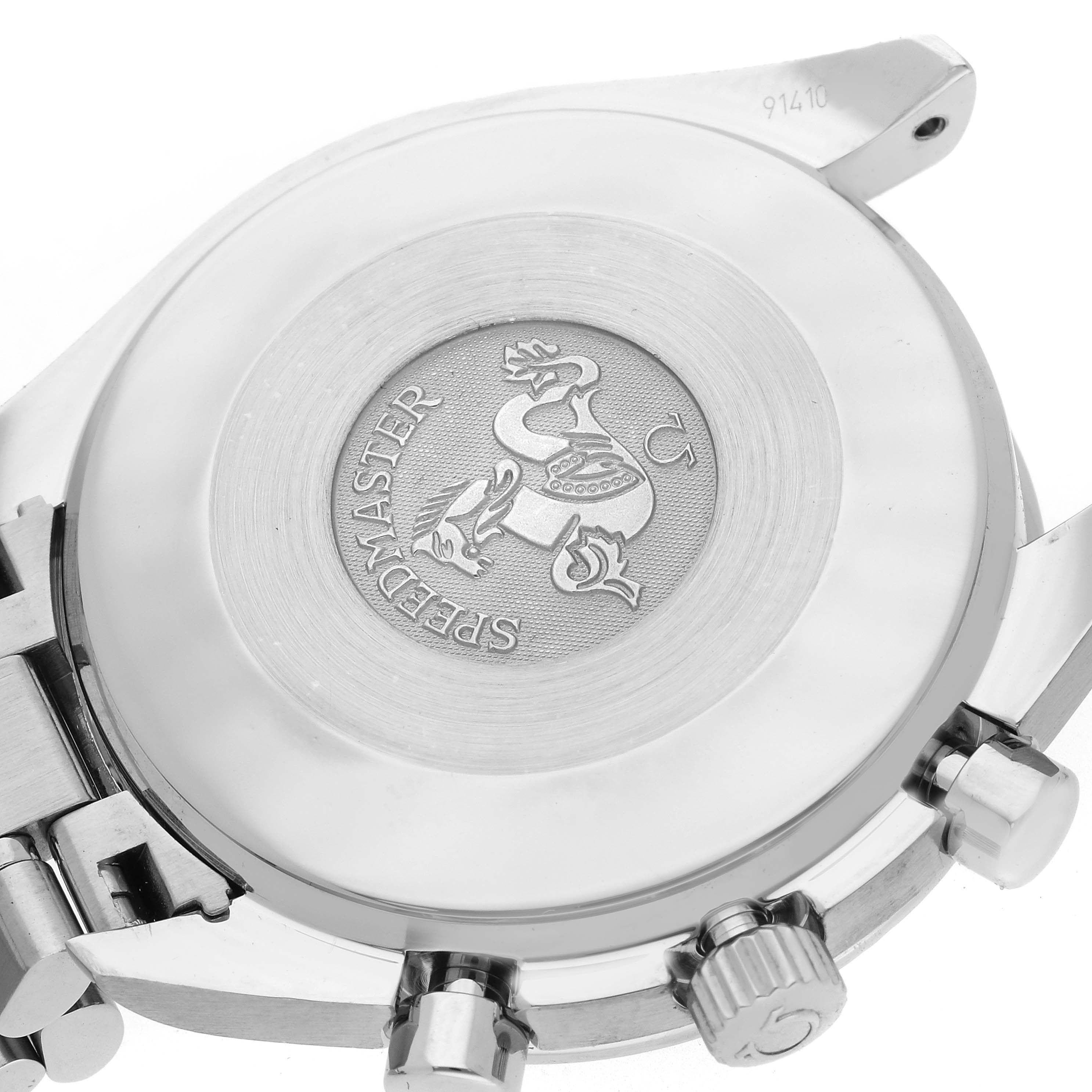 The image shows the case back of an Omega Speedmaster 3539.50.00 Men
s Stainless Steel Black Dial 3539.50.00 Men
s Stainless Steel Black Dial watch with visible engravings and pushers.