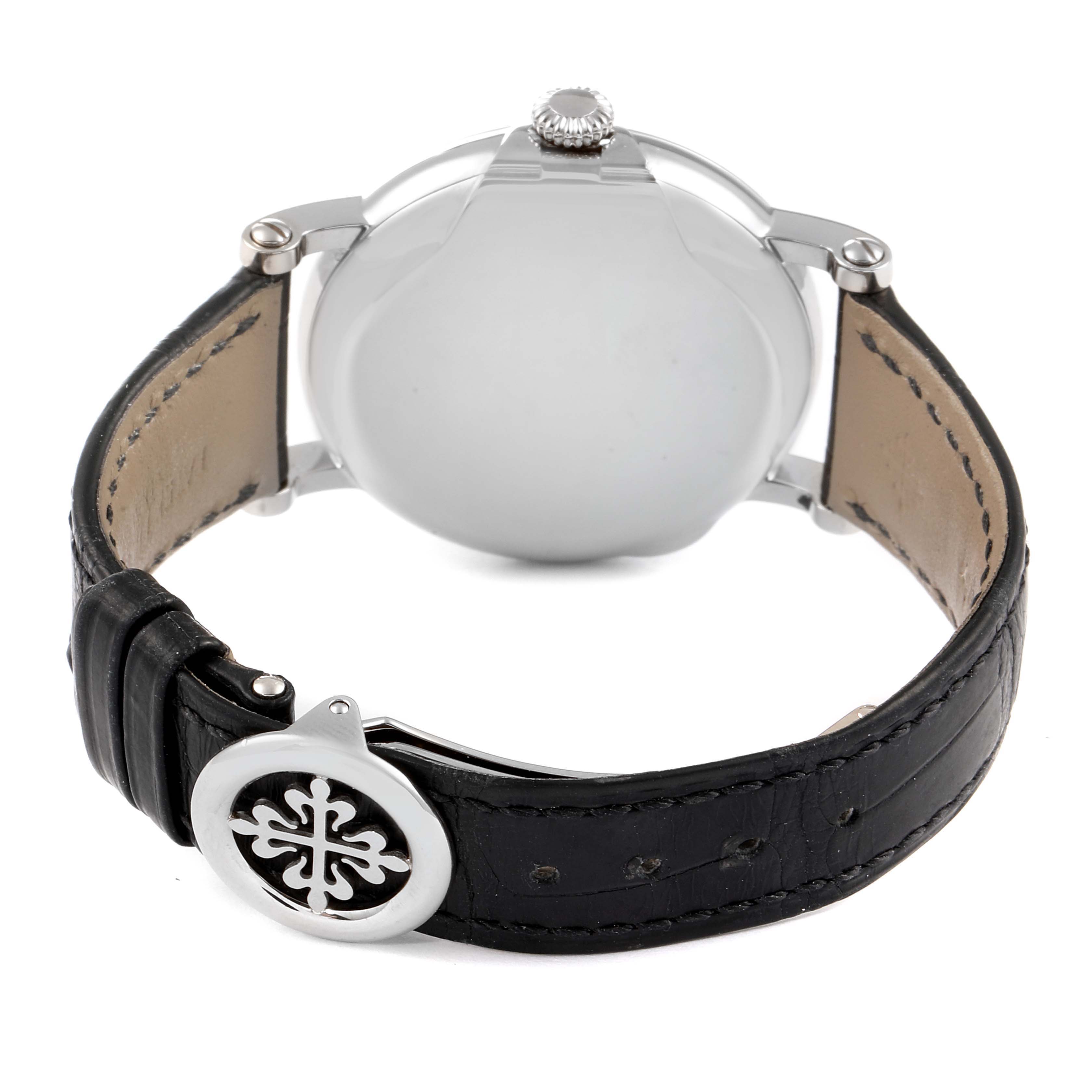 The image shows the back view of a Patek Philippe Calatrava 5153G Men
s White Gold Silver Dial 5153G Men
s White Gold Silver Dial watch, focusing on the clasp and leather strap.