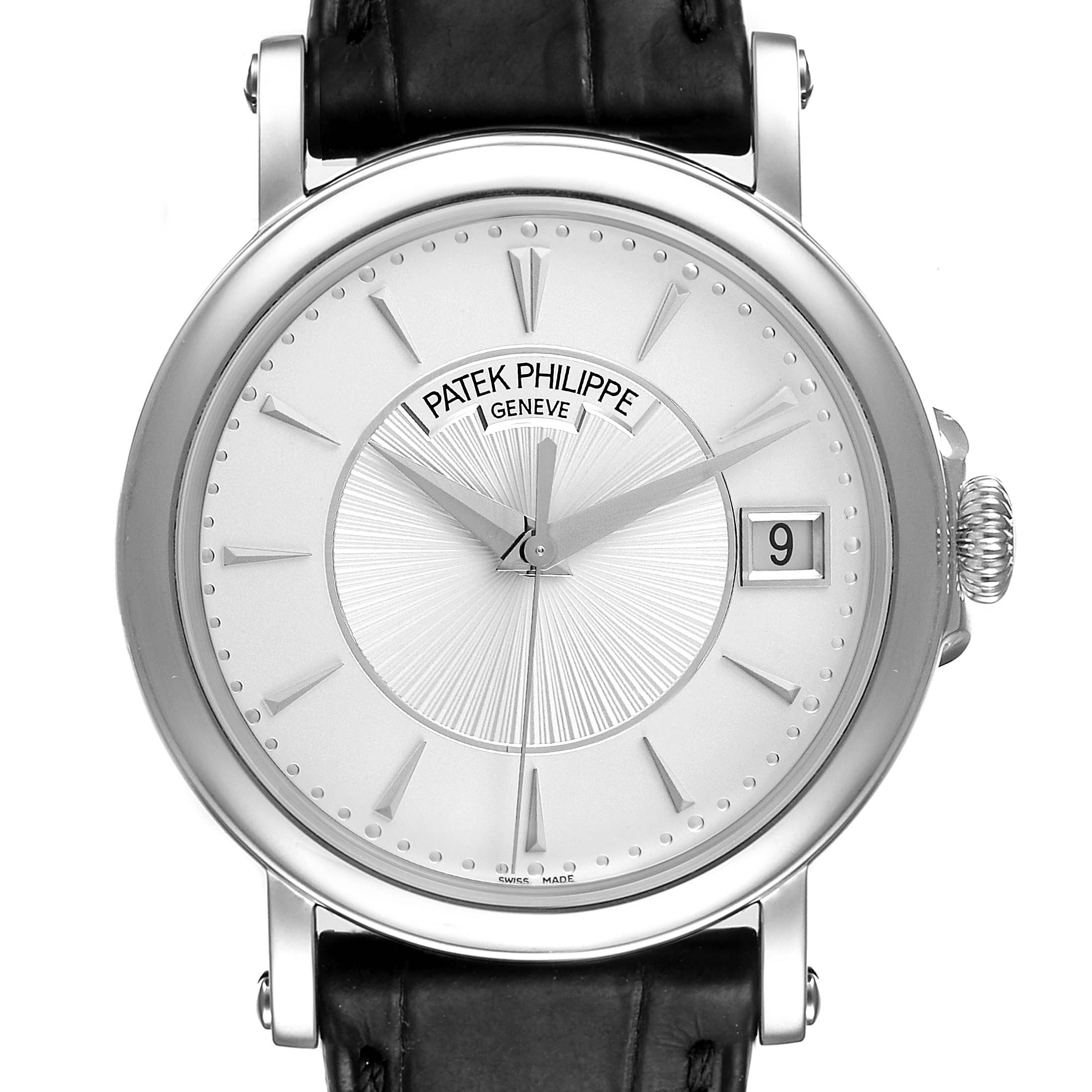 The image shows a front view of the Patek Philippe Calatrava 5153G Men
s White Gold Silver Dial 5153G Men
s White Gold Silver Dial watch, displaying its face, hour markers, date window, and black leather strap.
