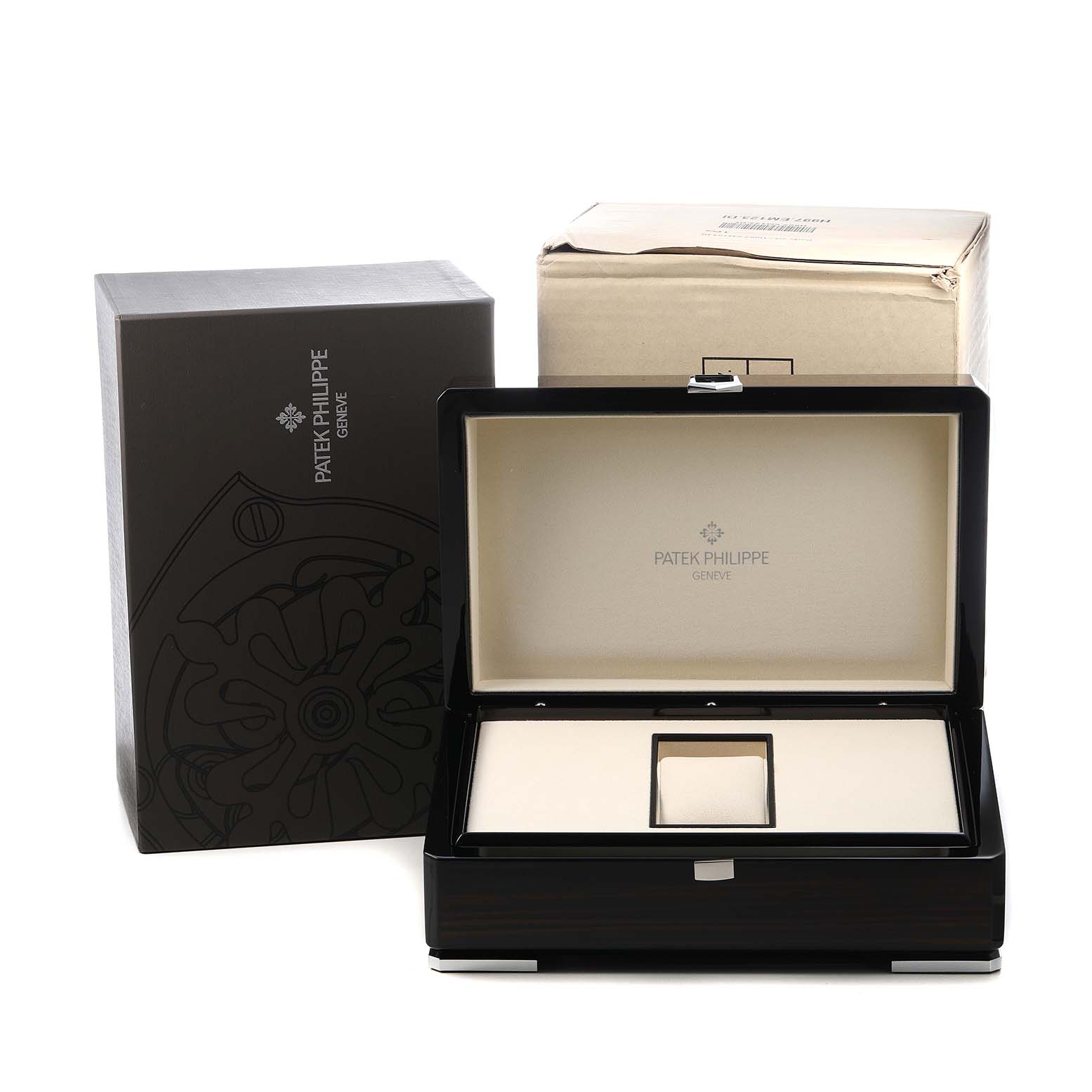 The image shows the packaging box and display case for a Patek Philippe Complications 5146R-001 Men's Rose Gold White Dial model, viewed from the front.