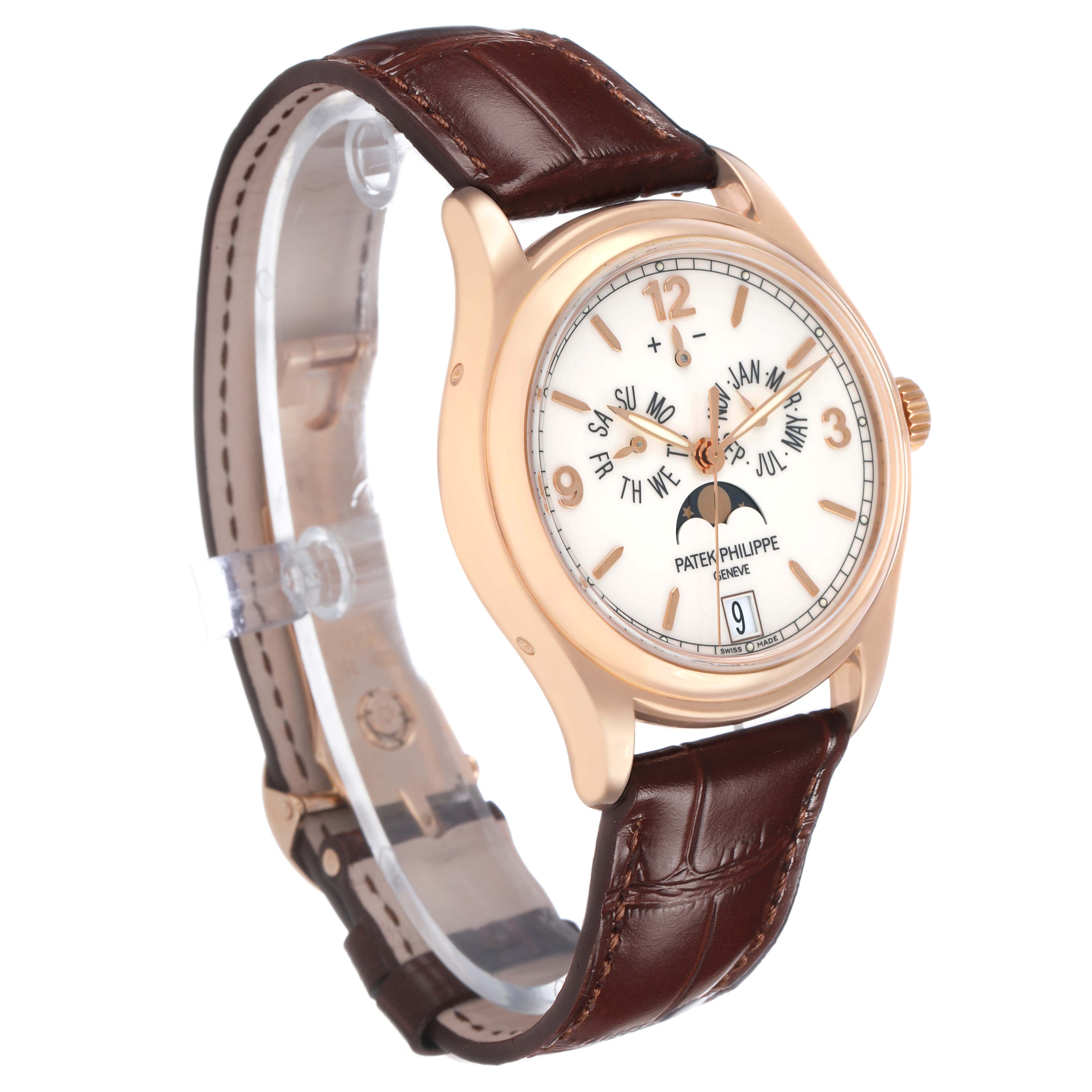 The Patek Philippe Complications 5146R-001 Men's Rose Gold White Dial watch is shown at a three-quarter angle, displaying the dial and brown leather strap.