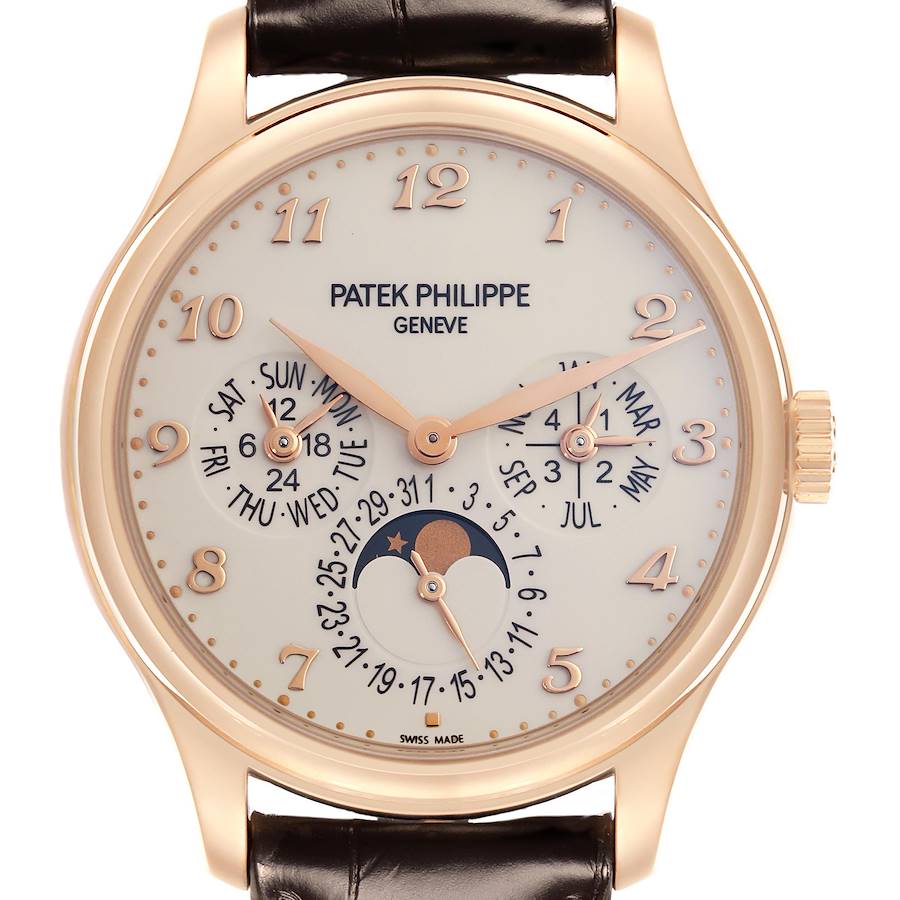 The Patek Philippe Complications watch is shown from the front, displaying the face, dial, hands, and moon phase feature.