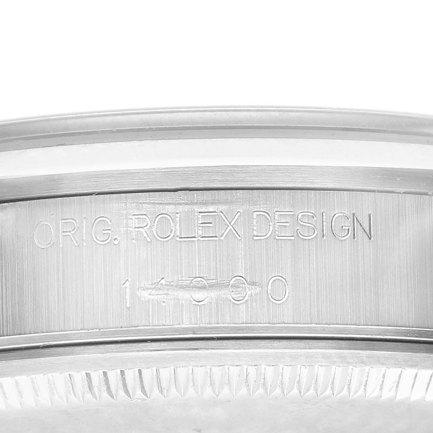The image shows a close-up of the side engraving on a Rolex Air-King 14000 Men's Stainless Steel Blue Dial, featuring the design and model number.