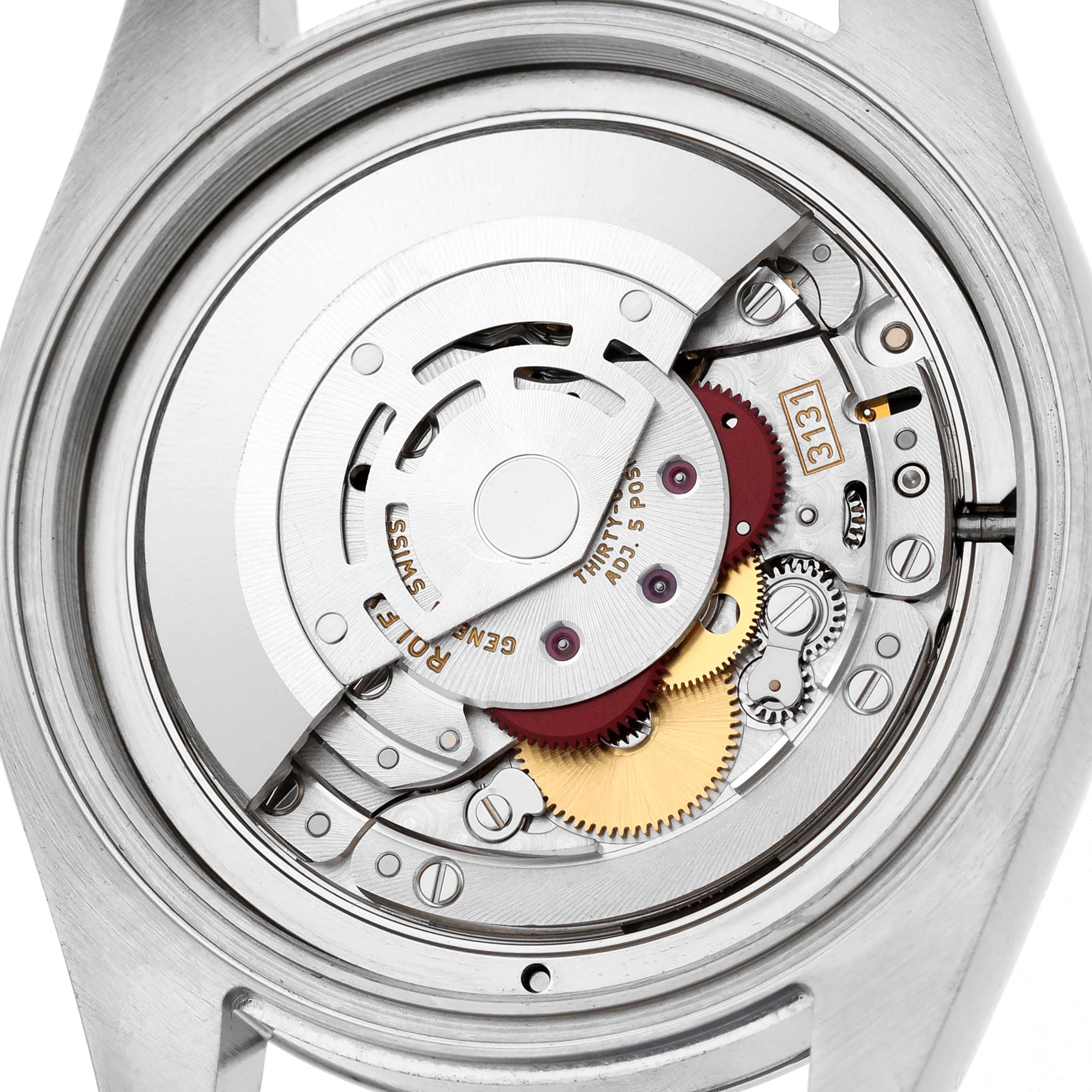 The image shows the movement and internal mechanism of the Rolex Air-King 116900 Men's Stainless Steel Black Dial watch from a back view.