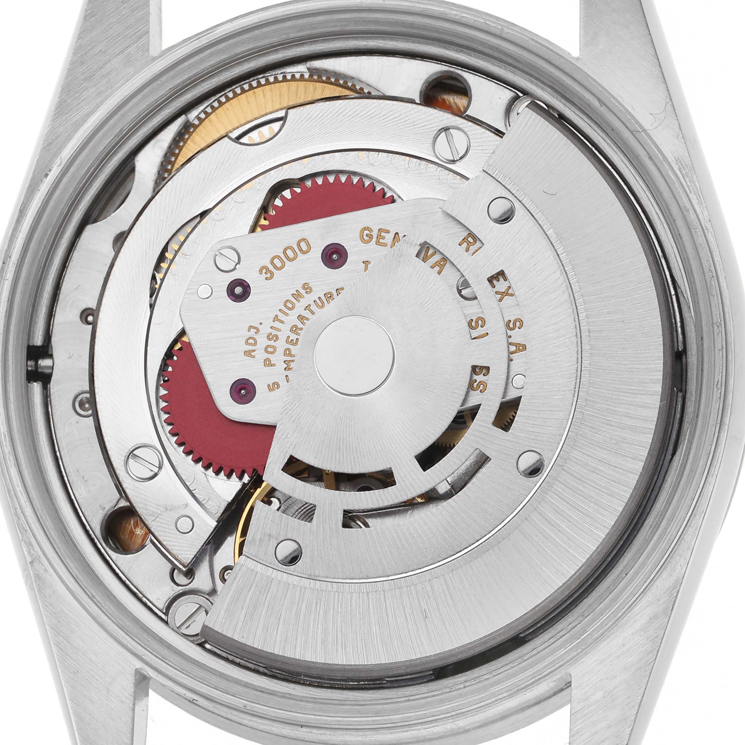 The image shows the movement of a Rolex Air-King 14010 Men's Stainless Steel Blue Dial 14010 Men's Stainless Steel Blue Dial watch viewed from the back, highlighting gears and mechanisms.