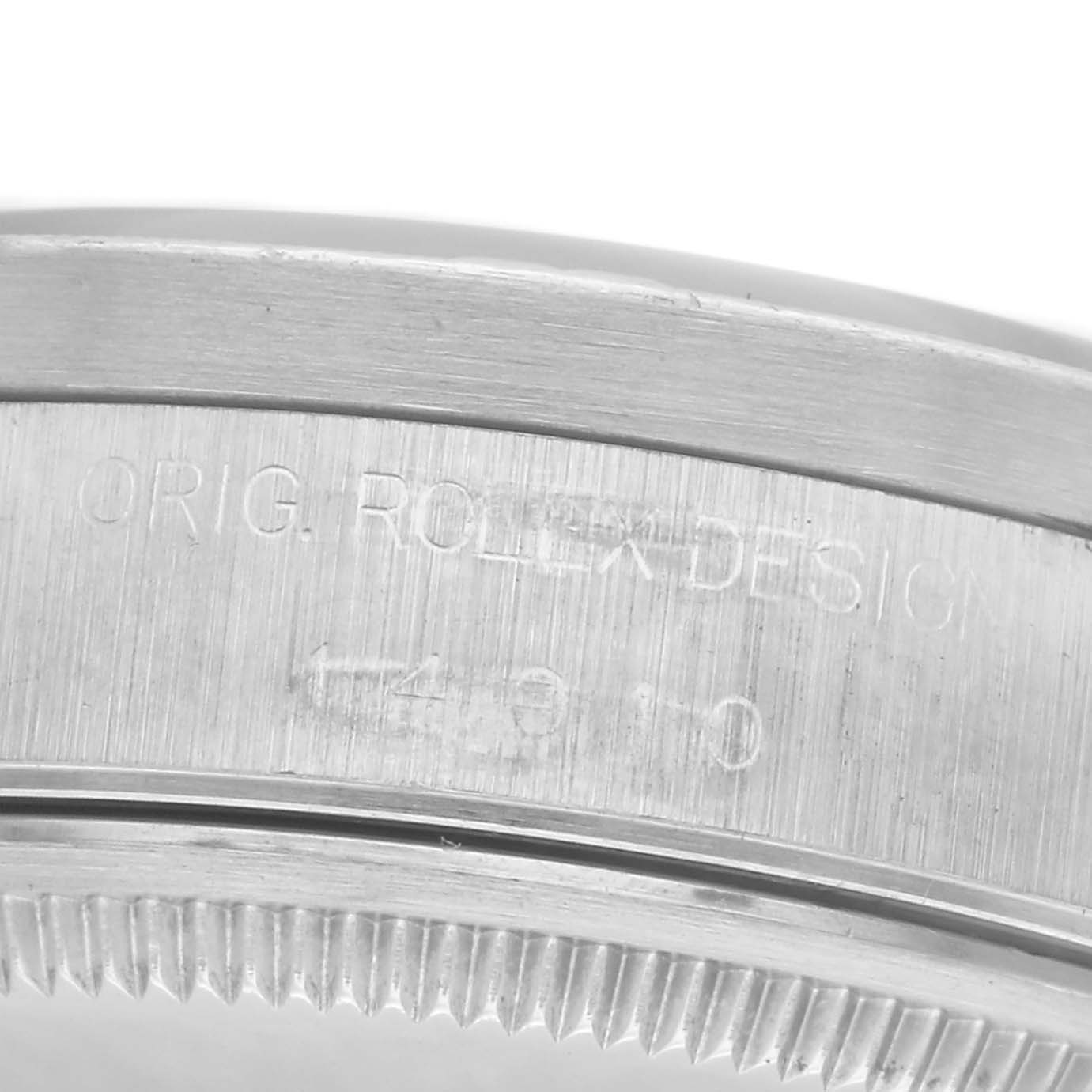 The image shows a close-up of the side of a Rolex Air-King 14010 Men's Stainless Steel Blue Dial 14010 Men's Stainless Steel Blue Dial watch case, highlighting the engraved text and part of the bezel.