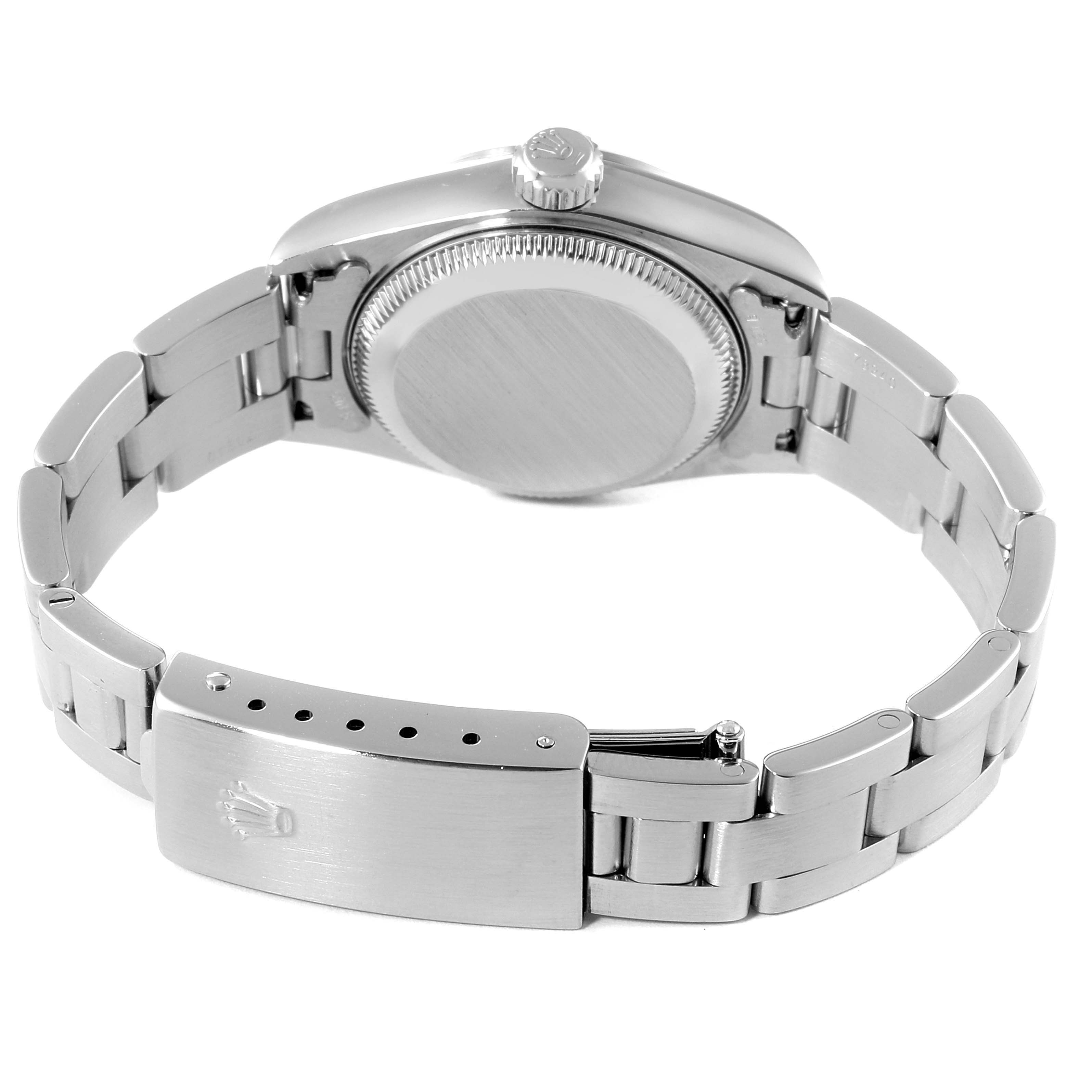 The image shows the backside of a Rolex Date 79160 Women
s Stainless Steel White Dial 79160 Women
s Stainless Steel White Dial model watch, focusing on the case back and bracelet clasp.