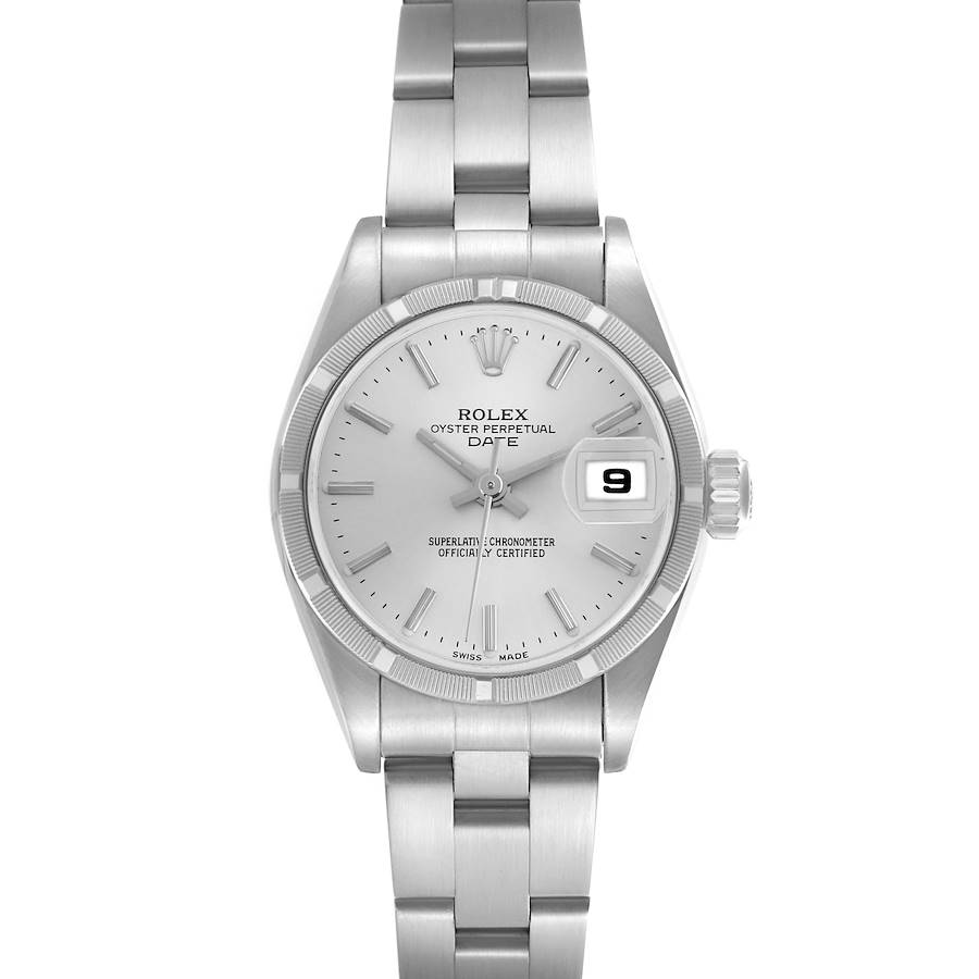 The Rolex Date model watch is shown from a top-down view, displaying the face, bracelet, bezel, and crown.
