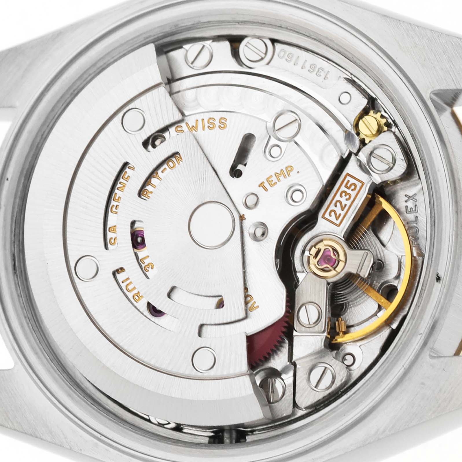 The image shows the internal movement mechanism of a Rolex Datejust 79173 Women's Stainless Steel Champagne Dial watch from a back angle.