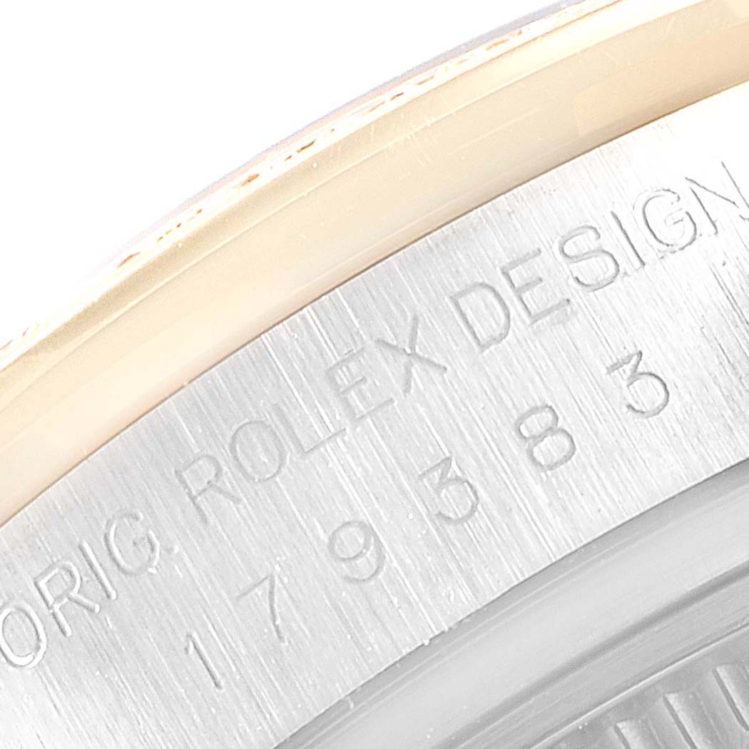 This image shows a close-up of the serial number engraving on the case of a Rolex Datejust 179383 Women
s Steel and Gold (two tone) Mother of Pearl Dial 179383 Women
s Steel and Gold (two tone) Mother of Pearl Dial watch.