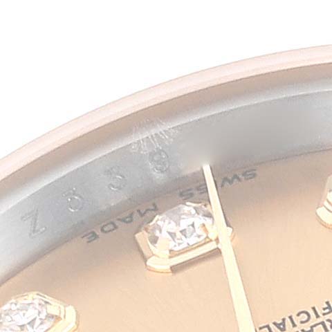 The image shows a close-up angled view of a Rolex Datejust 179173 Women's Steel and Gold (two tone) Champagne Dial 179173 Women's Steel and Gold (two tone) Champagne Dial watch dial with diamond hour markers and part of the rehaut.