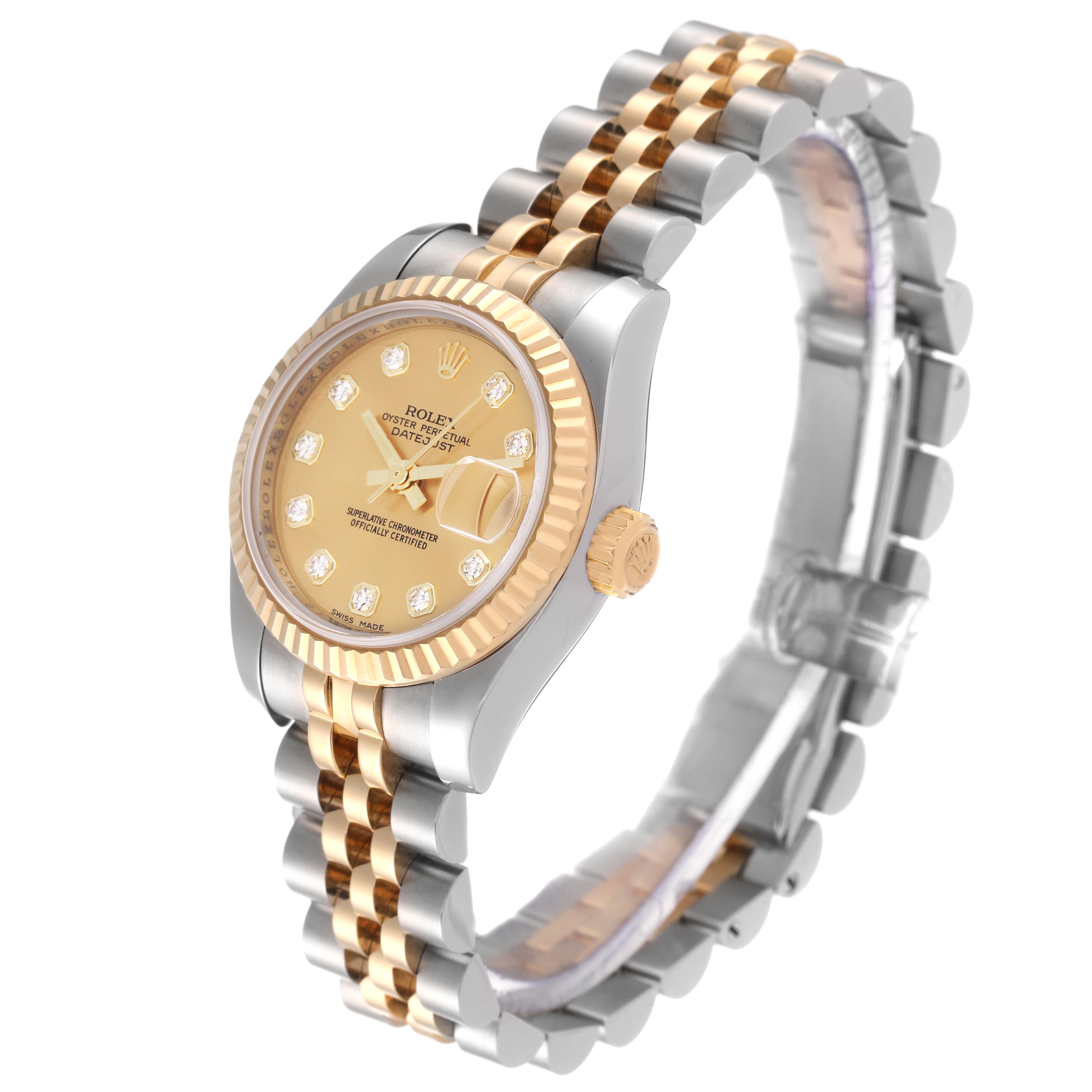 This Rolex Datejust 179173 Women's Steel and Gold (two tone) Champagne Dial 179173 Women's Steel and Gold (two tone) Champagne Dial watch is shown at an angle displaying its face, crown, and two-tone bracelet.