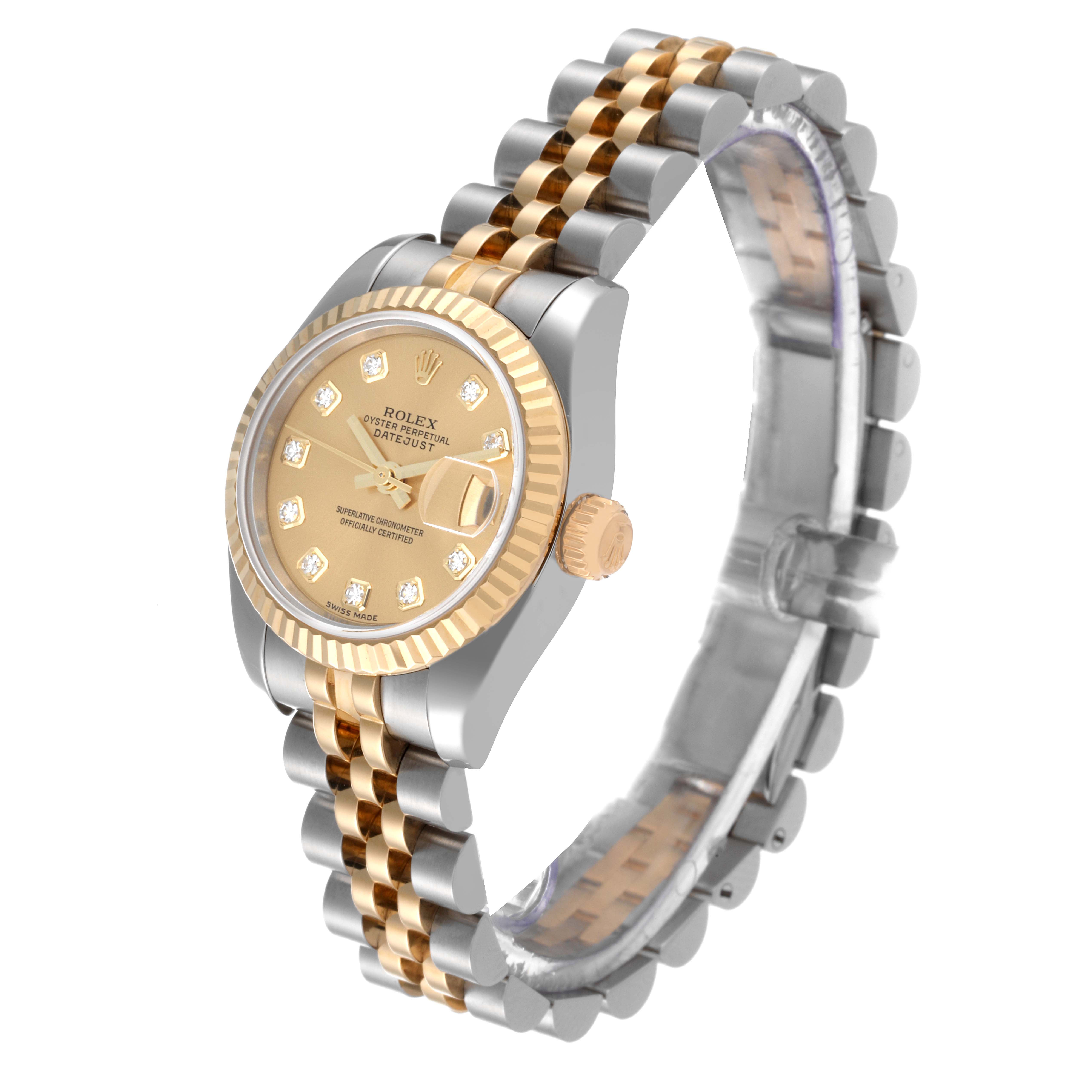 The image shows a Rolex Datejust 179173 Women's Steel and Gold (two tone) Champagne Dial 179173 Women's Steel and Gold (two tone) Champagne Dial watch at a three-quarter angle, featuring its face, bezel, crown, and bracelet with a two-tone design.