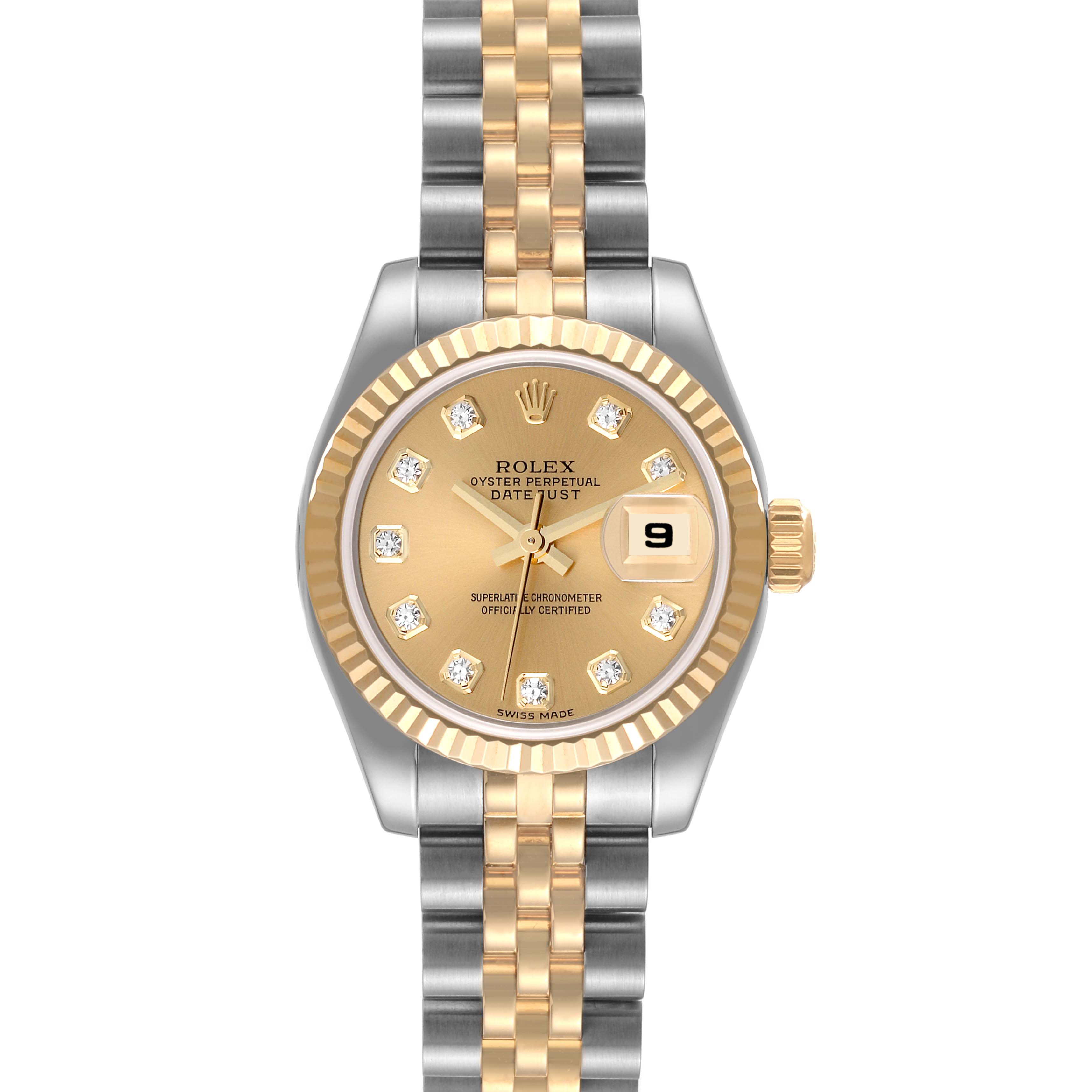 The image shows the front view of a Rolex Datejust 179173 Women's Steel and Gold (two tone) Champagne Dial 179173 Women's Steel and Gold (two tone) Champagne Dial watch, highlighting its face, dial, bezel, and bi-tone bracelet.