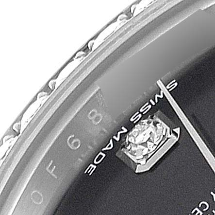 This close-up shows the dial and bezel of a Rolex Datejust 279384 Women's Stainless Steel Grey Dial 279384 Women's Stainless Steel Grey Dial, highlighting an hour marker with a diamond and part of the text "SWISS MADE."