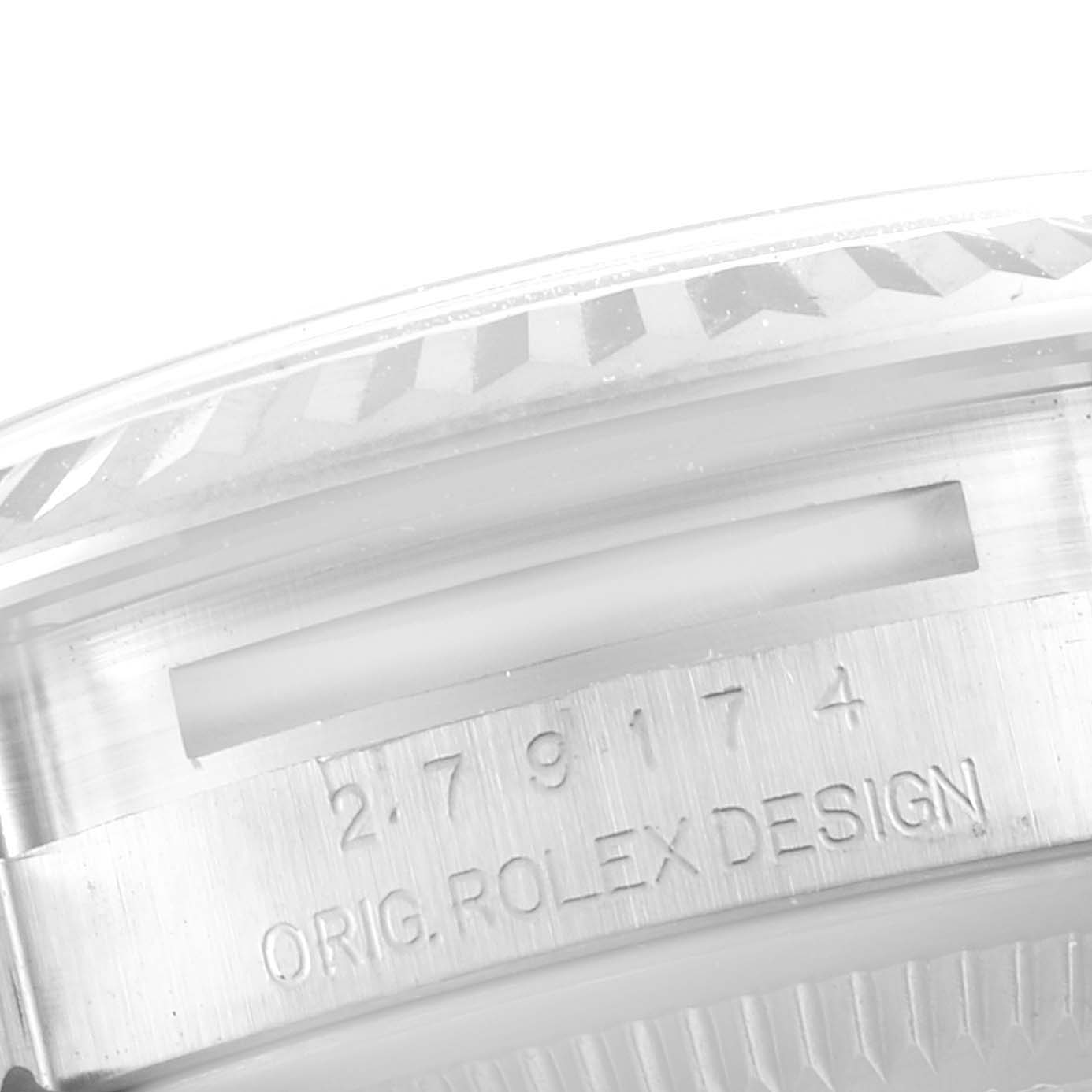The image shows a close-up of the case side and bezel with engraving on a Rolex Datejust 279174 Women's Stainless Steel Pink Dial 279174 Women's Stainless Steel Pink Dial model.
