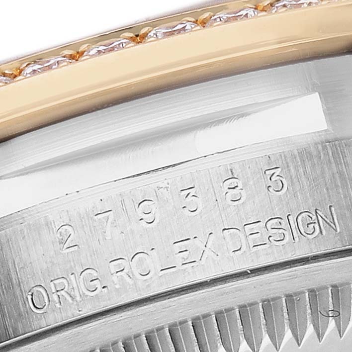 The image shows a close-up of the Rolex Datejust 279383 Women's Steel and Gold (two tone) Mother of Pearl Dial model, focusing on the edge of the bezel and engraved serial marking.