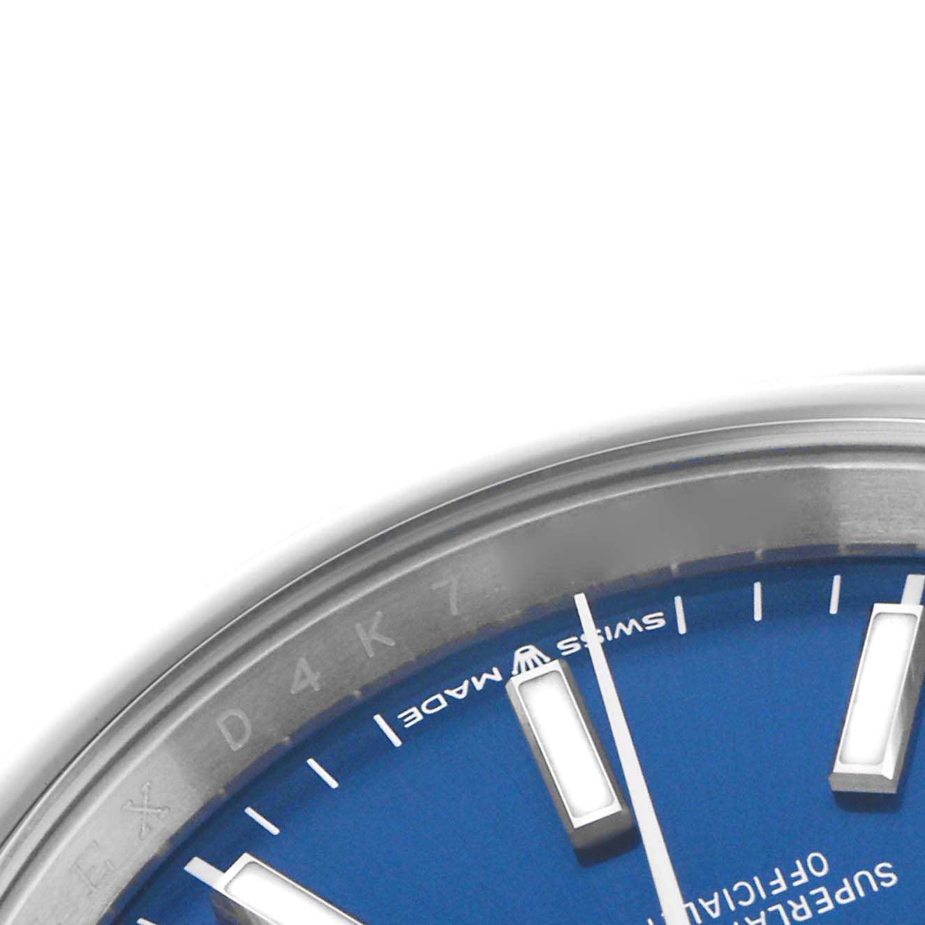 The image shows a close-up of the Rolex Datejust 126200 Men
s Stainless Steel Blue Dial 126200 Men
s Stainless Steel Blue Dial dial, highlighting the blue face, indices, and part of the bezel.