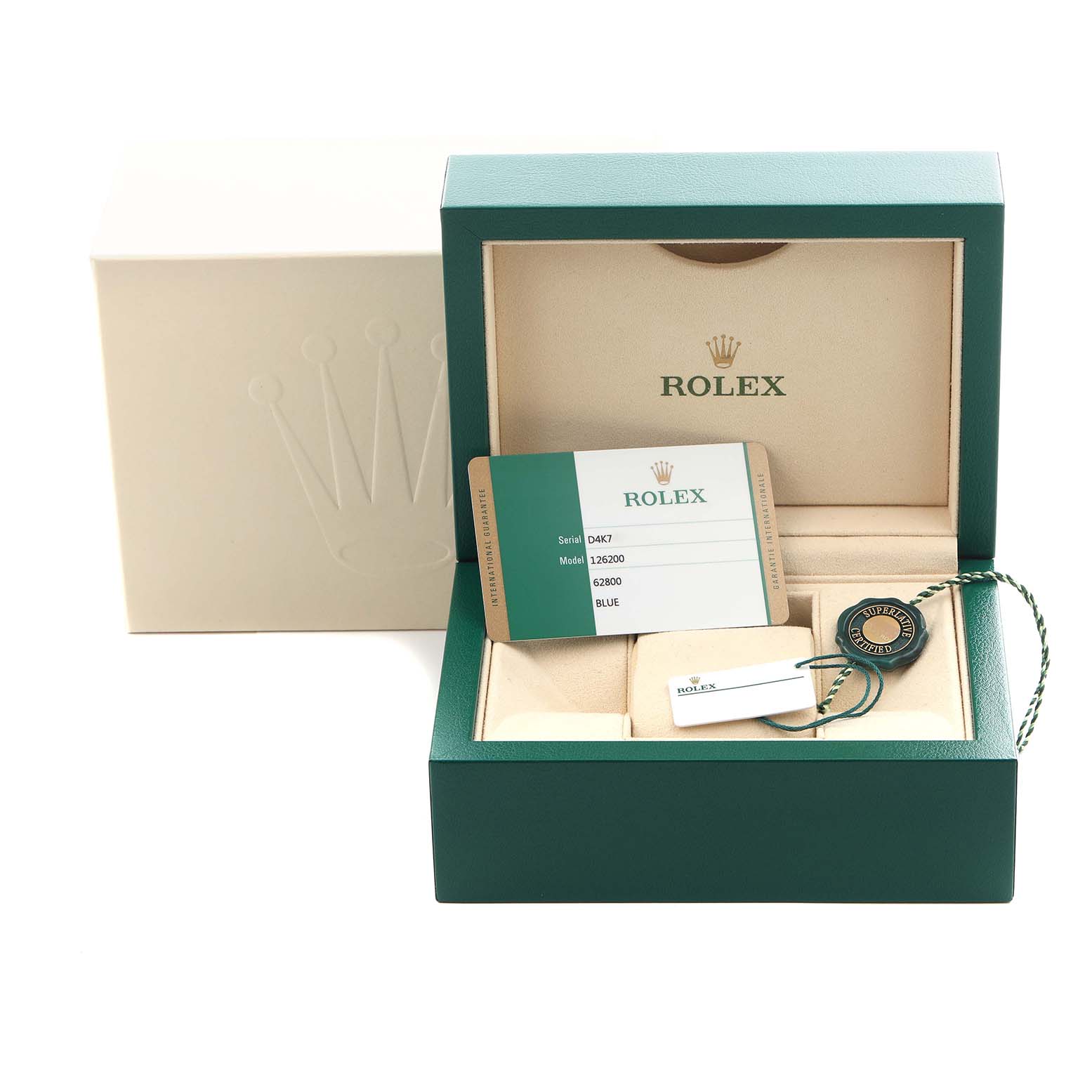 The image shows the packaging and accessories for a Rolex Datejust 126200 Men
s Stainless Steel Blue Dial 126200 Men
s Stainless Steel Blue Dial, including a box, tag, and card, viewed from the front.