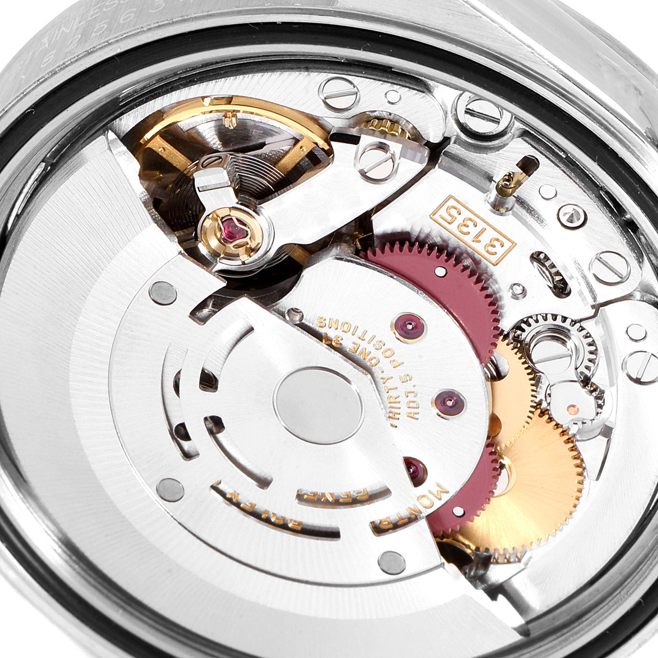 The image shows an open back view of the movement mechanism of a Rolex Datejust 16200 Men
s Stainless Steel Grey Dial 16200 Men
s Stainless Steel Grey Dial watch, highlighting its intricate gears and components.