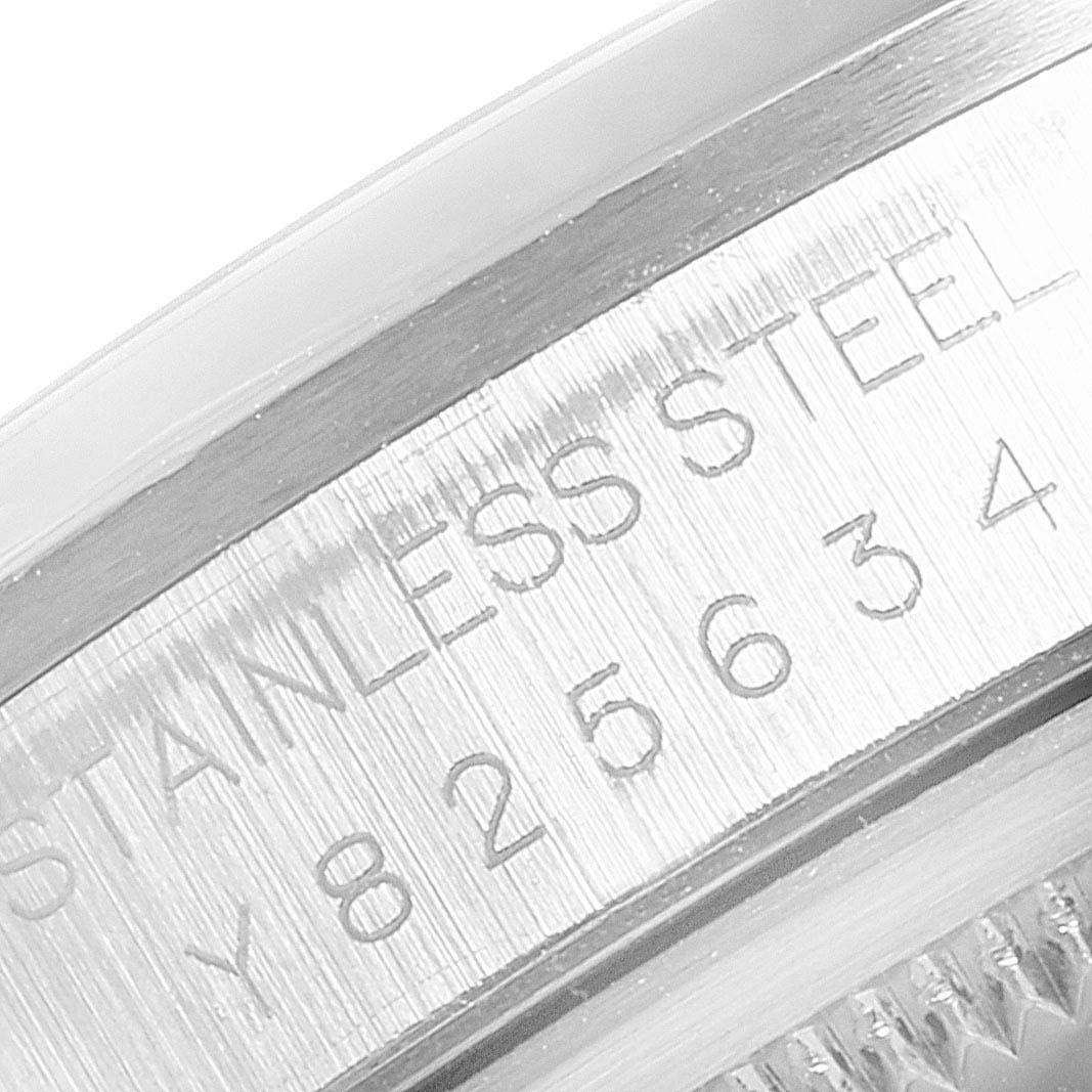 This close-up image shows the serial number engraving on the stainless steel case of a Rolex Datejust 16200 Men
s Stainless Steel Grey Dial 16200 Men
s Stainless Steel Grey Dial watch.