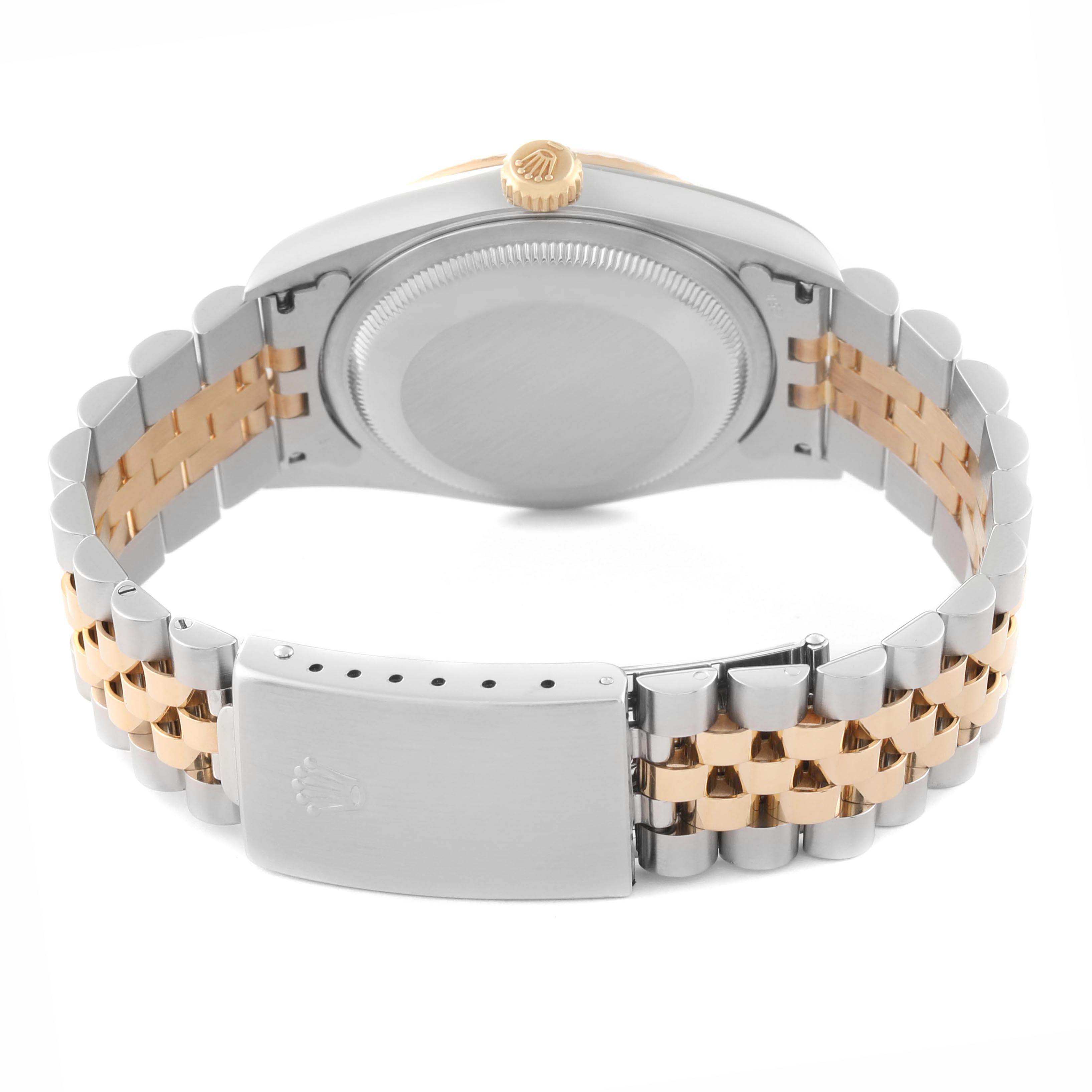 The image shows the back view of a Rolex Datejust 16233 Men's Steel and Gold (two tone) Champagne Dial, highlighting the case back, two-tone Jubilee bracelet, and clasp.