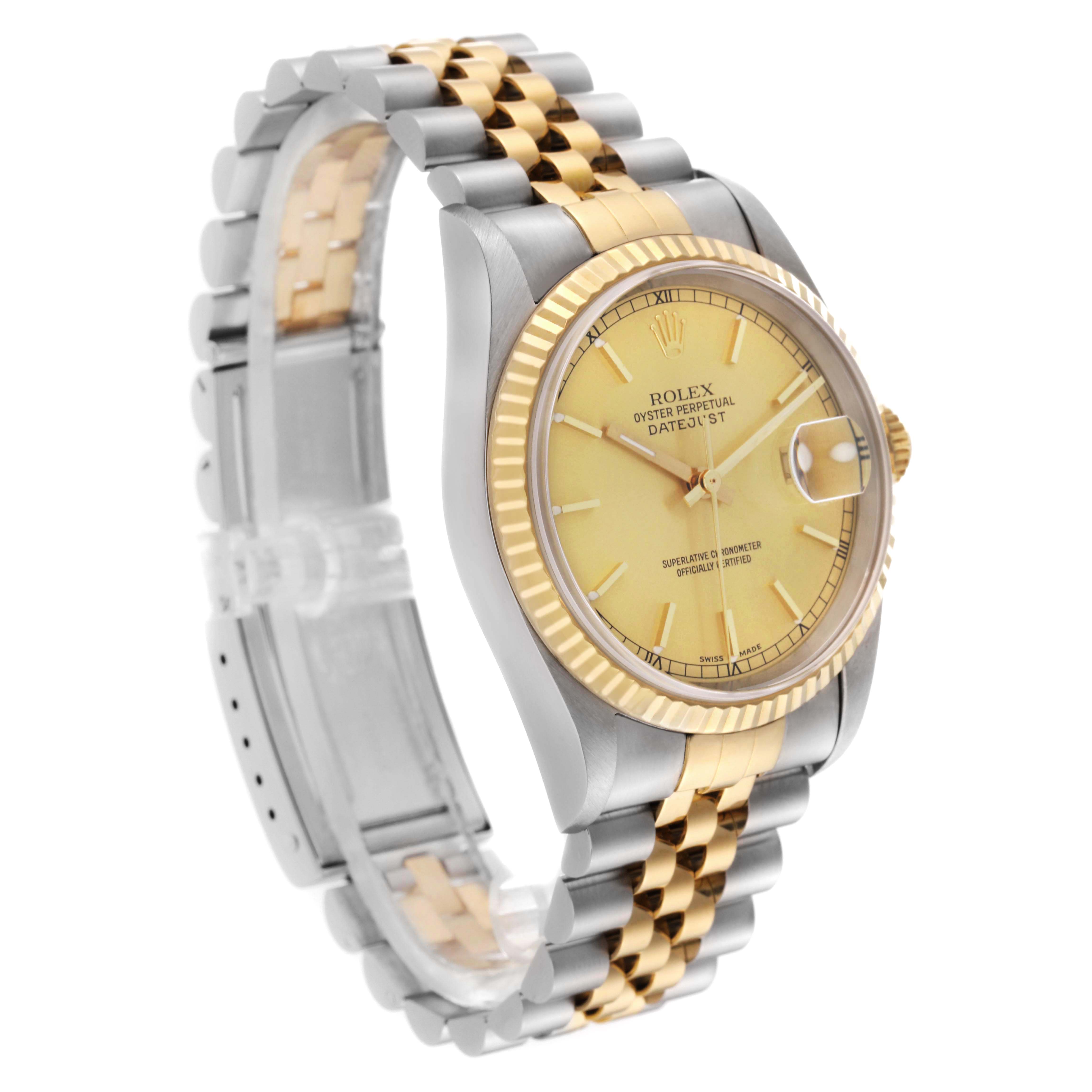 The Rolex Datejust 16233 Men's Steel and Gold (two tone) Champagne Dial watch is angled to show the face, bezel, and part of the bracelet, highlighting its two-tone design.