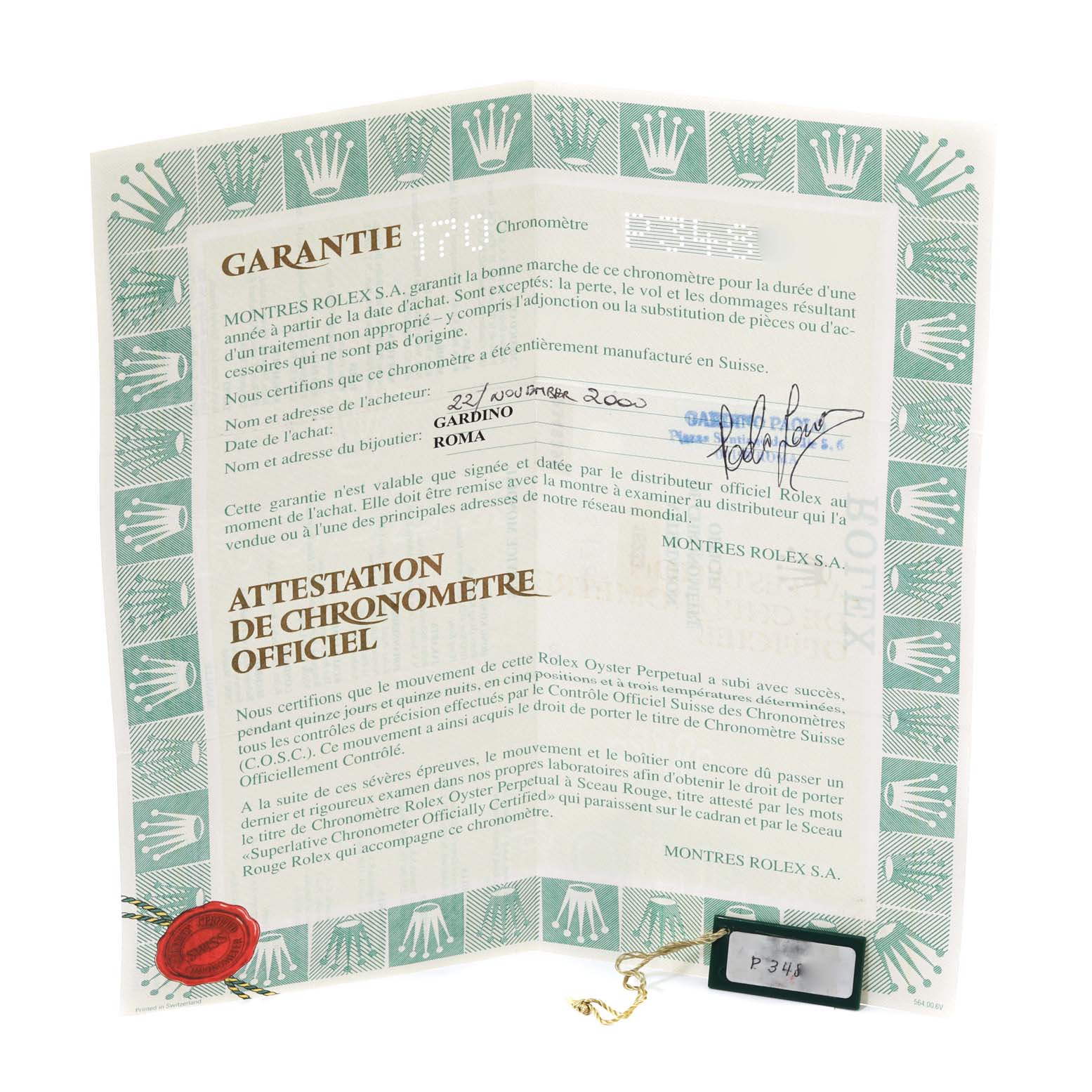 The image shows the warranty certificate and tags for a Rolex Datejust 16233 Men's Steel and Gold (two tone) Champagne Dial watch.