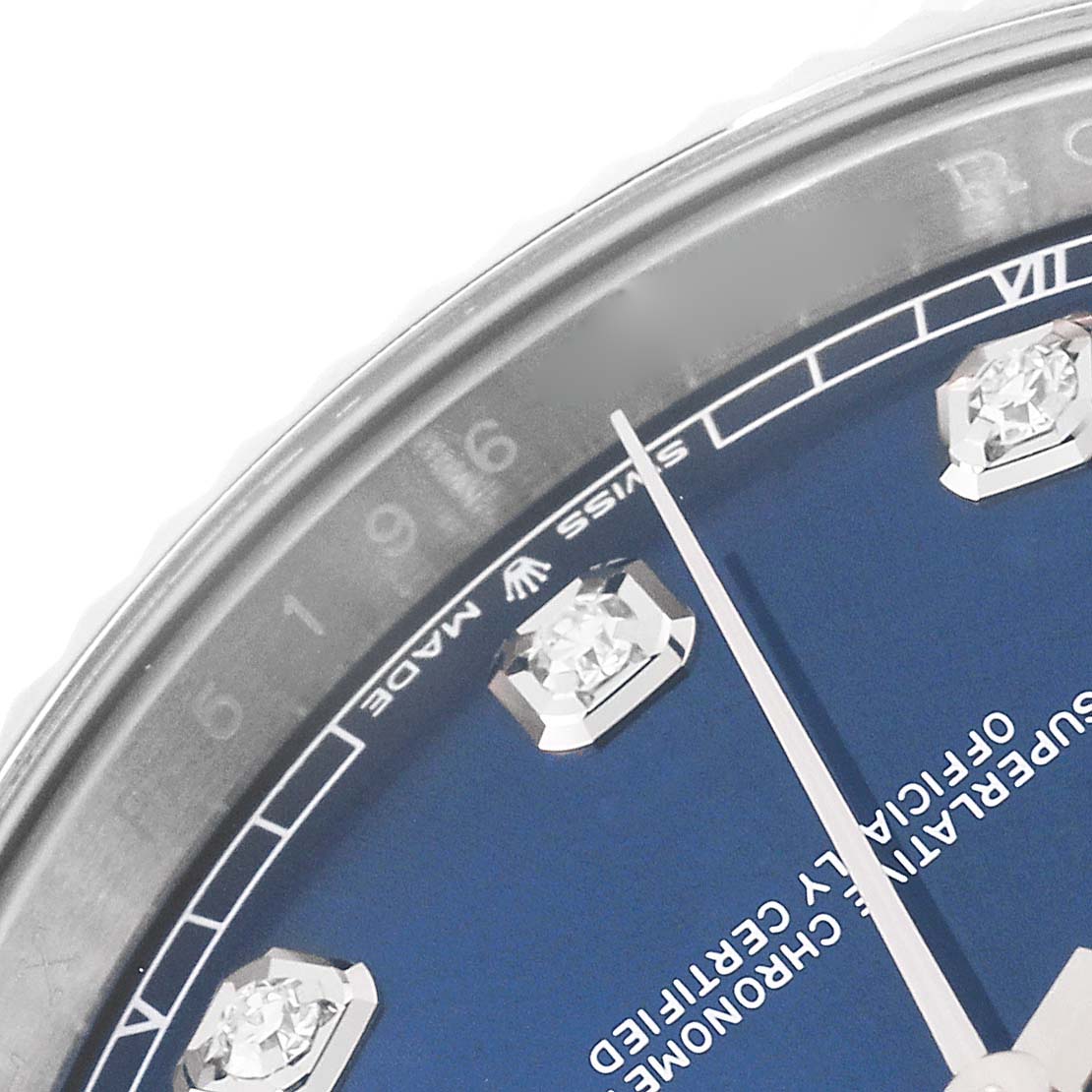 The image shows a close-up of the dial, hands, and diamond hour markers of a Rolex Datejust 41 126334 Men's Stainless Steel Blue Dial 126334 Men's Stainless Steel Blue Dial watch.