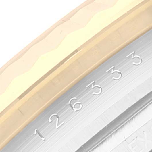 The image shows a close-up of the bezel and part of the engraved numbers on the Rolex Datejust 41 126333 Men's Steel and Gold (two tone) White Dial 126333 Men's Steel and Gold (two tone) White Dial watch.